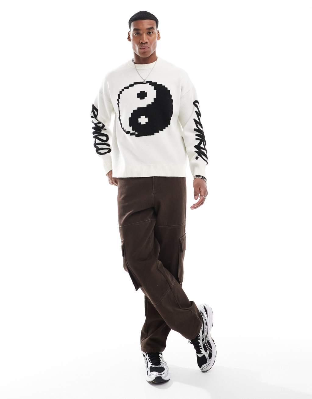 Bershka peace sign knitted sweater in ecru Product Image