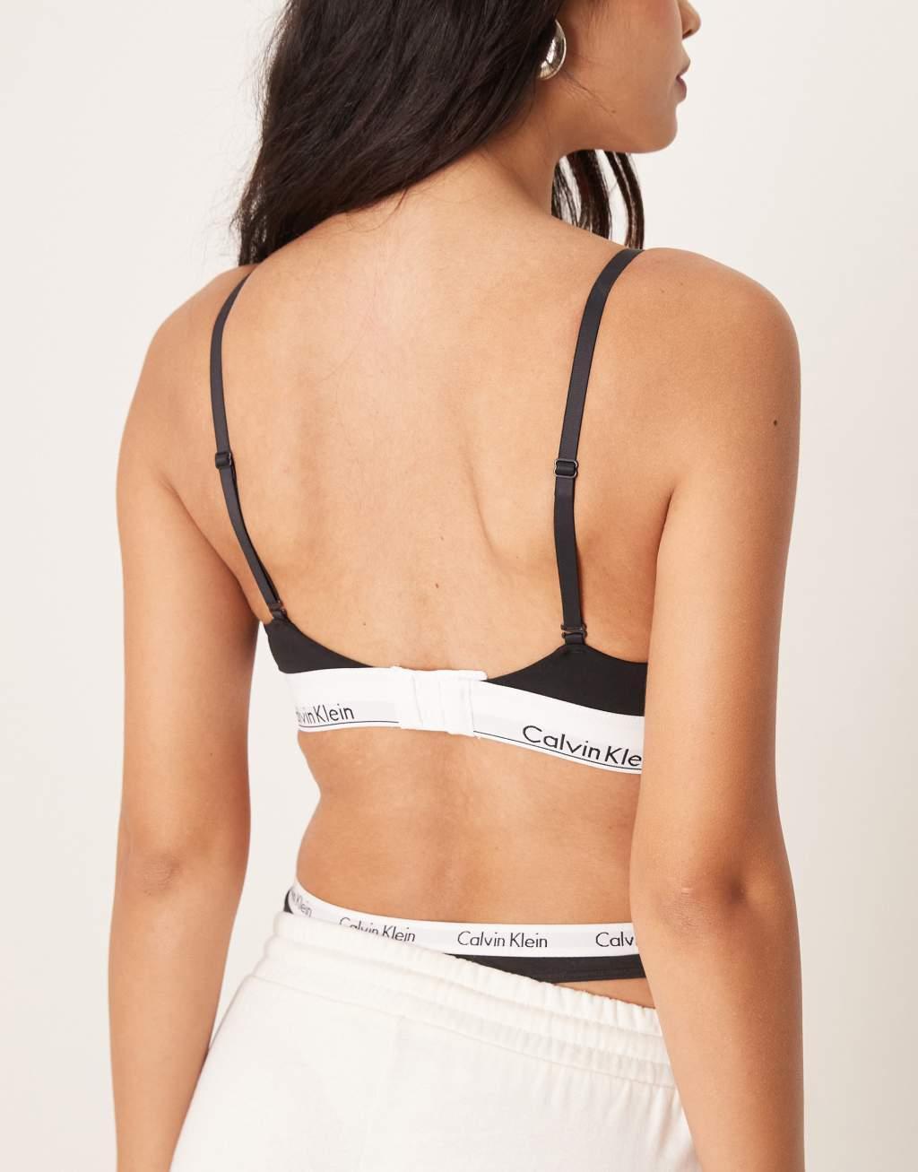 Calvin Klein modern cotton lightly lined triangle logo tape bralet in black Product Image