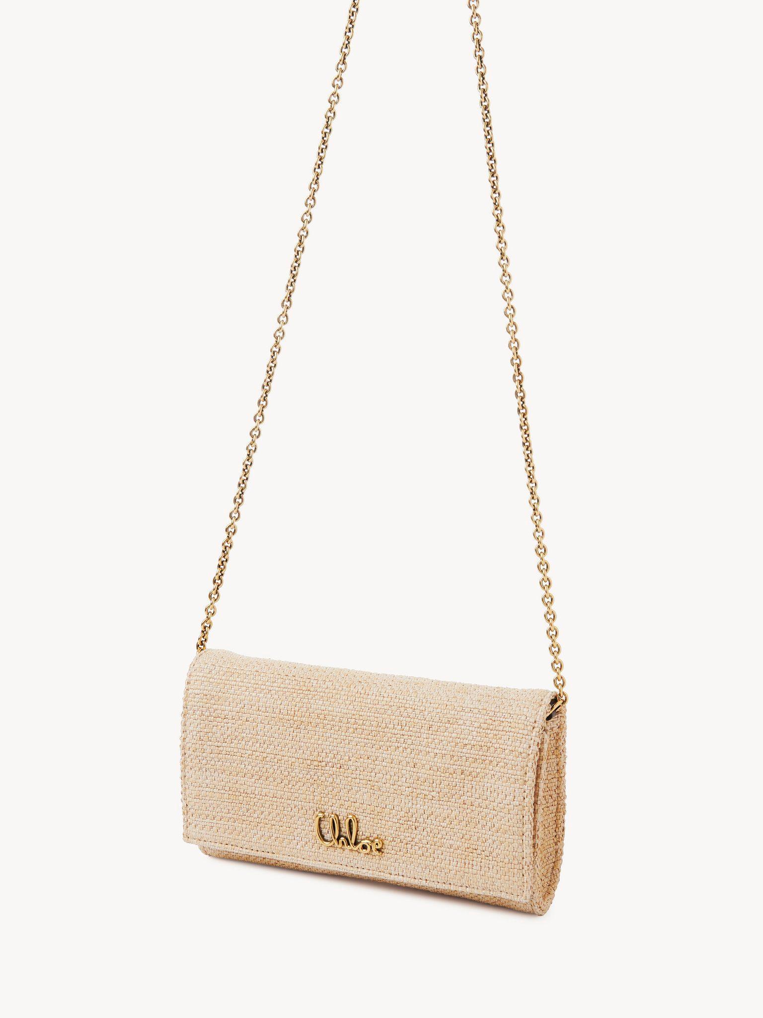 Chloé Iconic flap wallet on chain in raffia-effect fibers Product Image