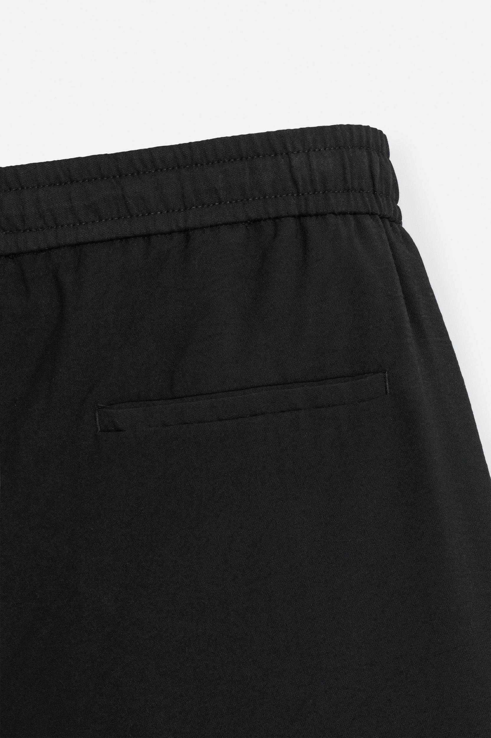 FLOWY RELAXED FIT BERMUDA SHORTS Product Image