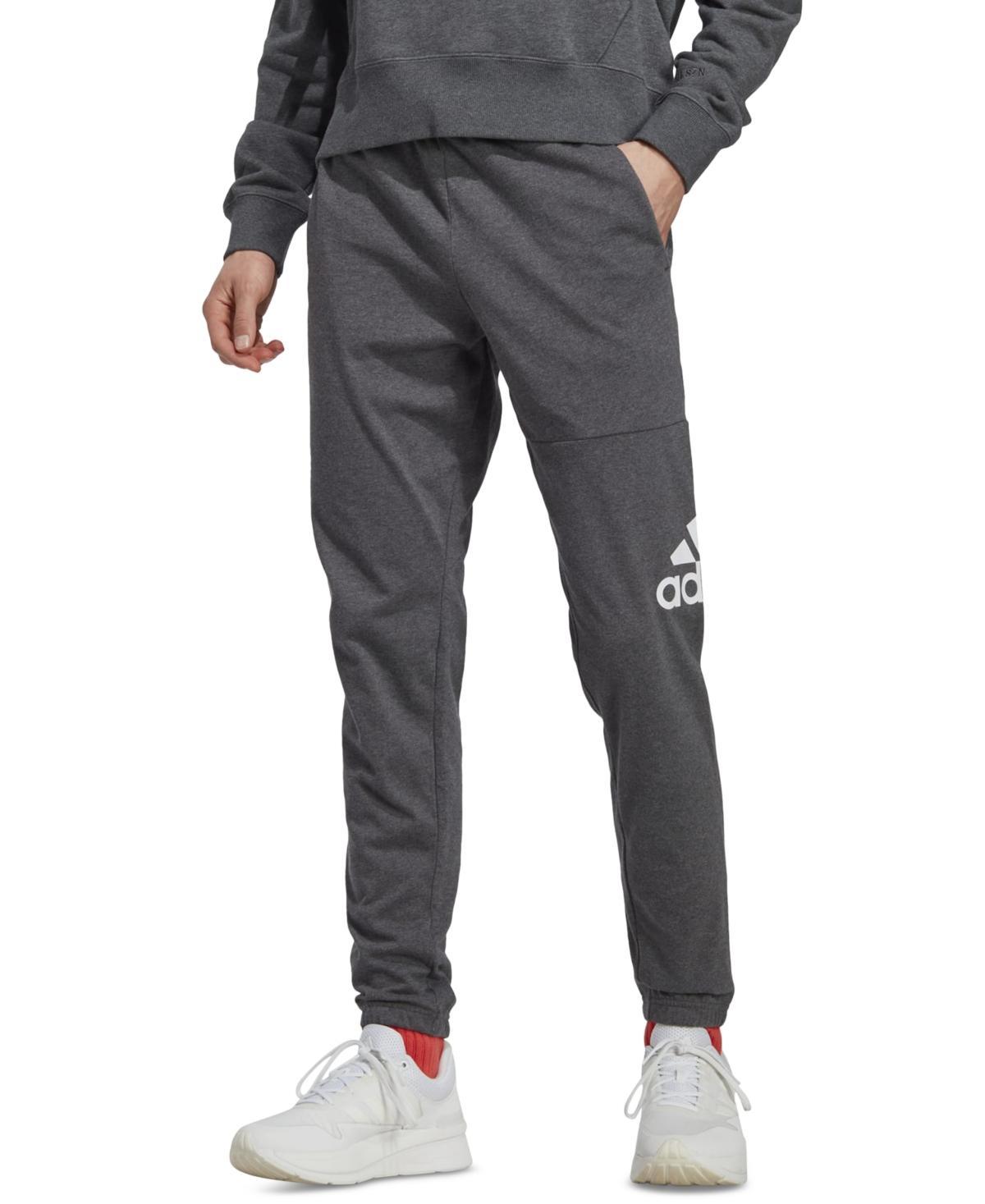 adidas Essentials Single Jersey Tapered Badge Of Sport Pants (Ink) Men's Clothing Product Image