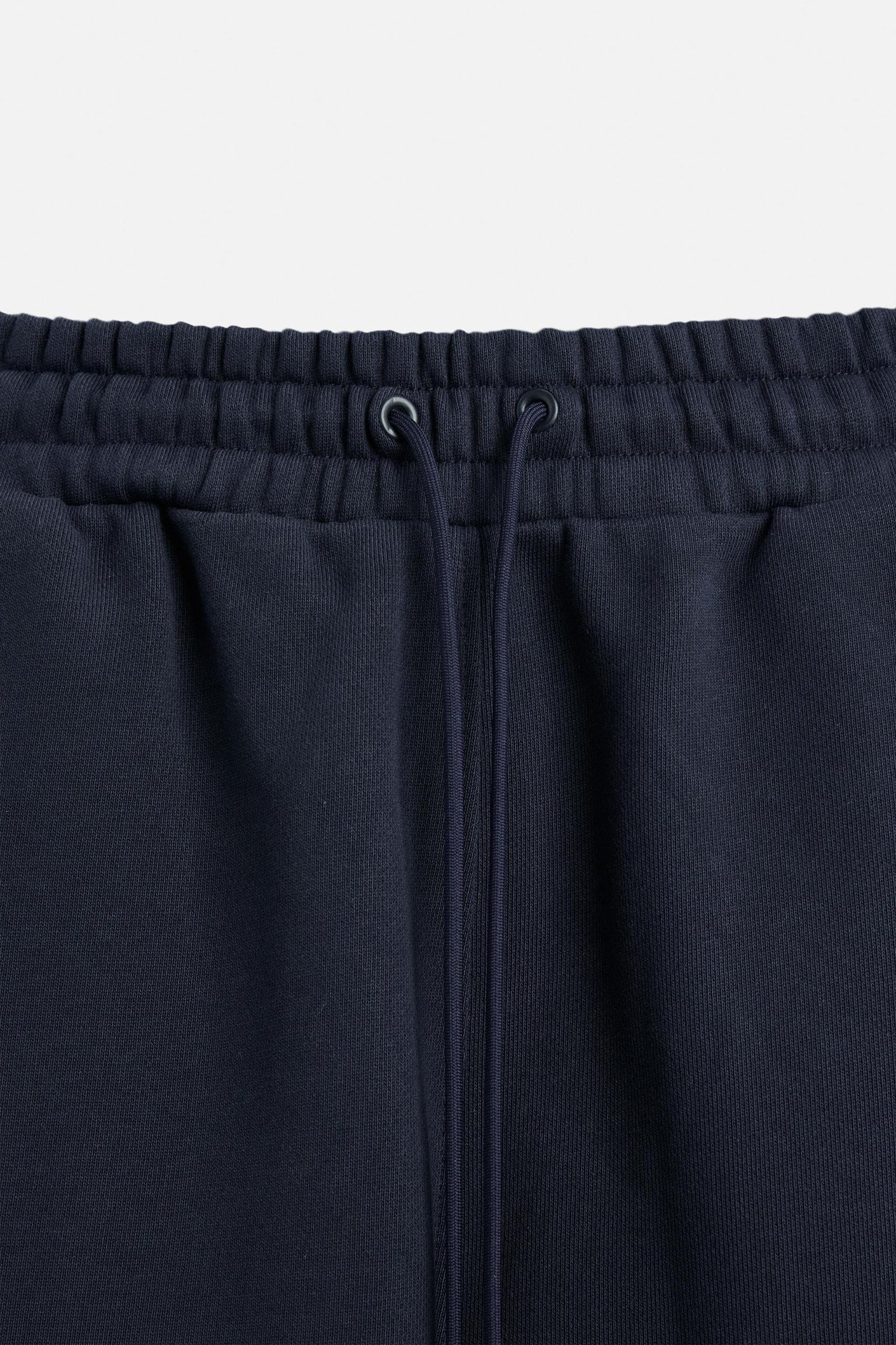 EMBROIDERED OVERSIZED FIT JOGGER SHORTS Product Image