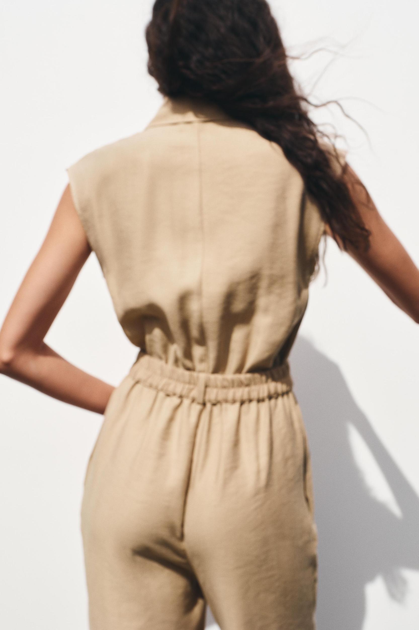 SLEEVELESS BELTED JUMPSUIT Product Image
