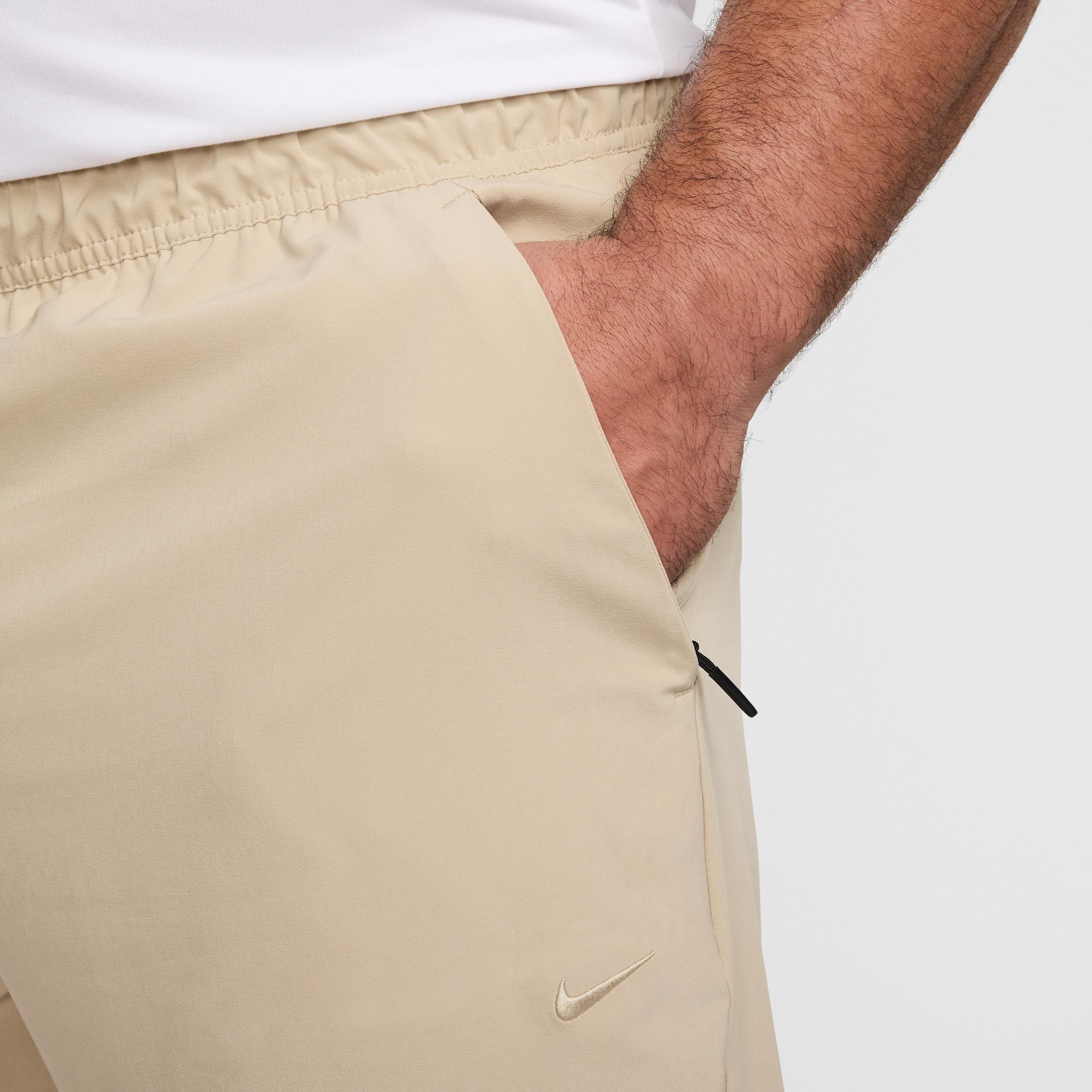 Nike Mens Unlimited Dri-FIT Zippered Cuff Versatile Pants | FB7548-320 Product Image