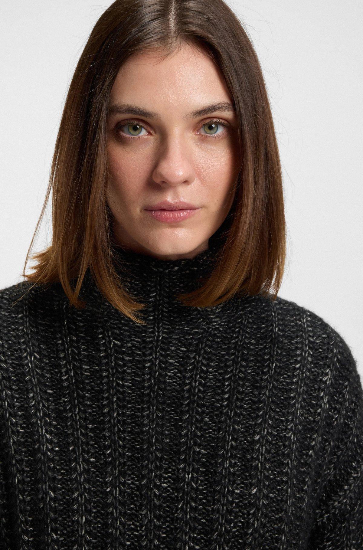 Knitted sweater with ribbed structure Product Image