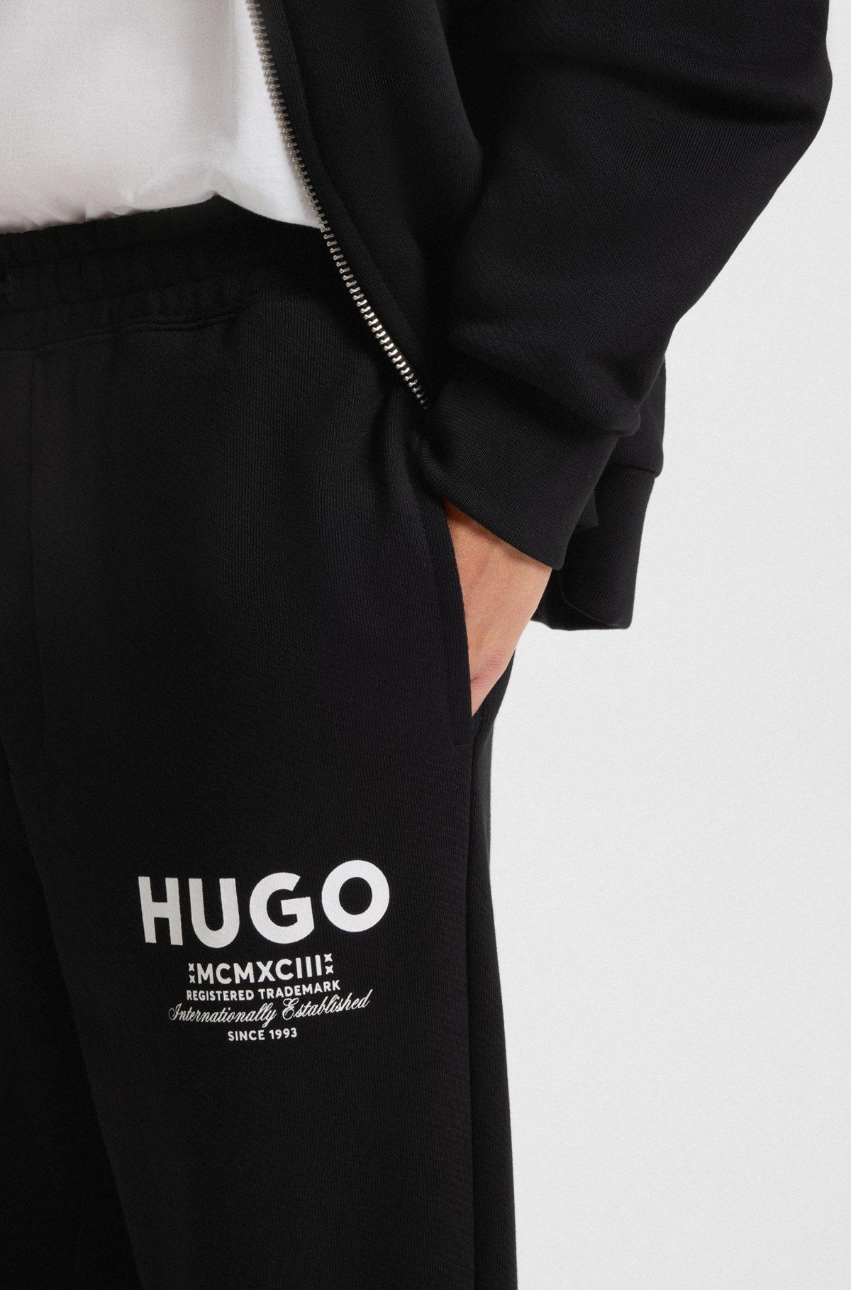 Cotton-terry tracksuit bottoms with logo print Product Image