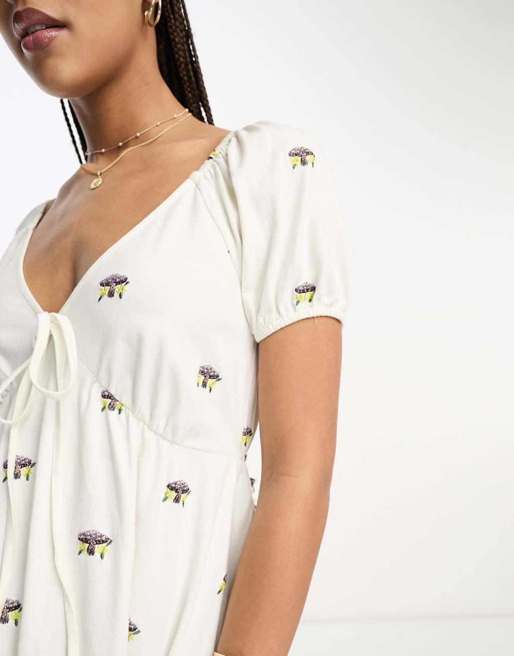 ASOS DESIGN embroidered v neck mini dress with mushroom embroidery Product Image