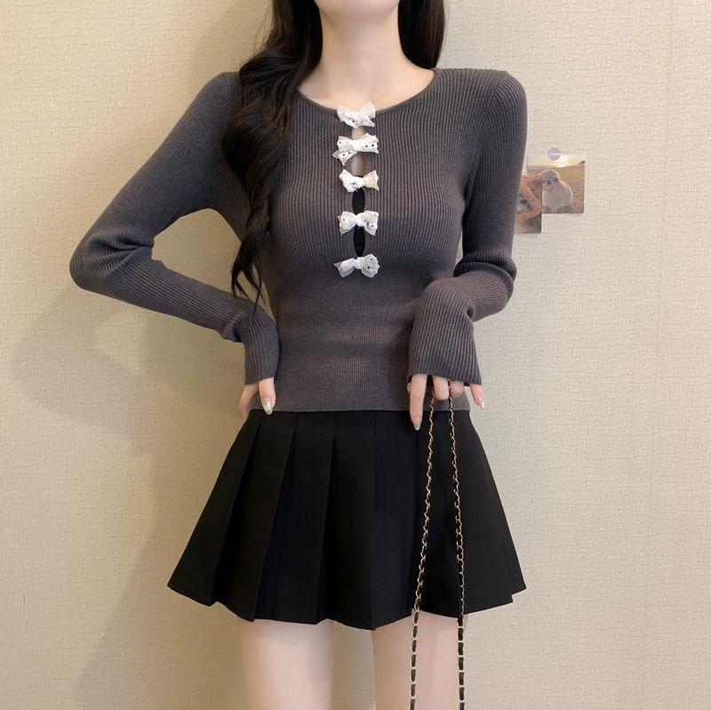 Long-Sleeve Round Neck Bow Cutout Ribbed Knit Top Product Image