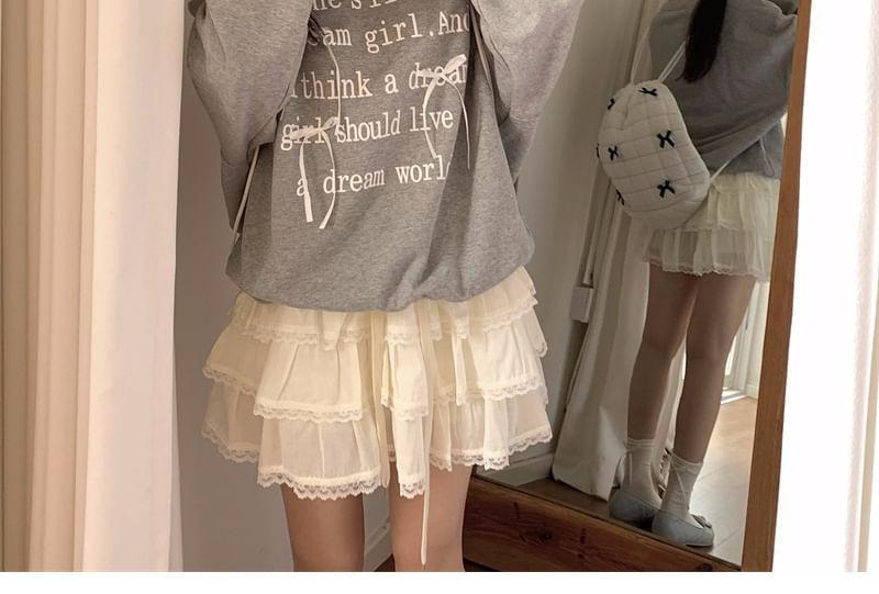 Round Neck Lettering Bow Cutout Sweatshirt Product Image