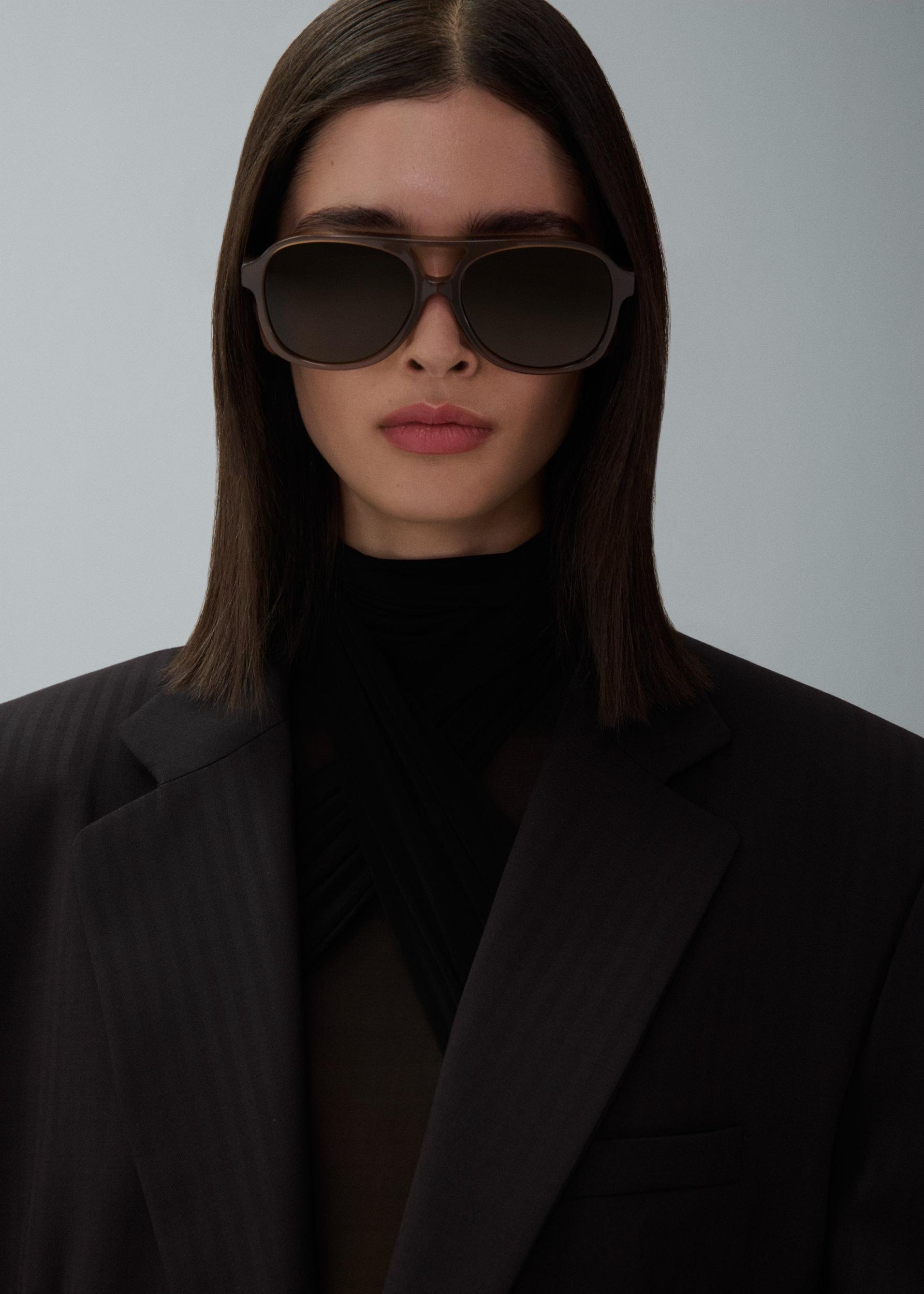 Sheer high neck bodysuit in black Product Image