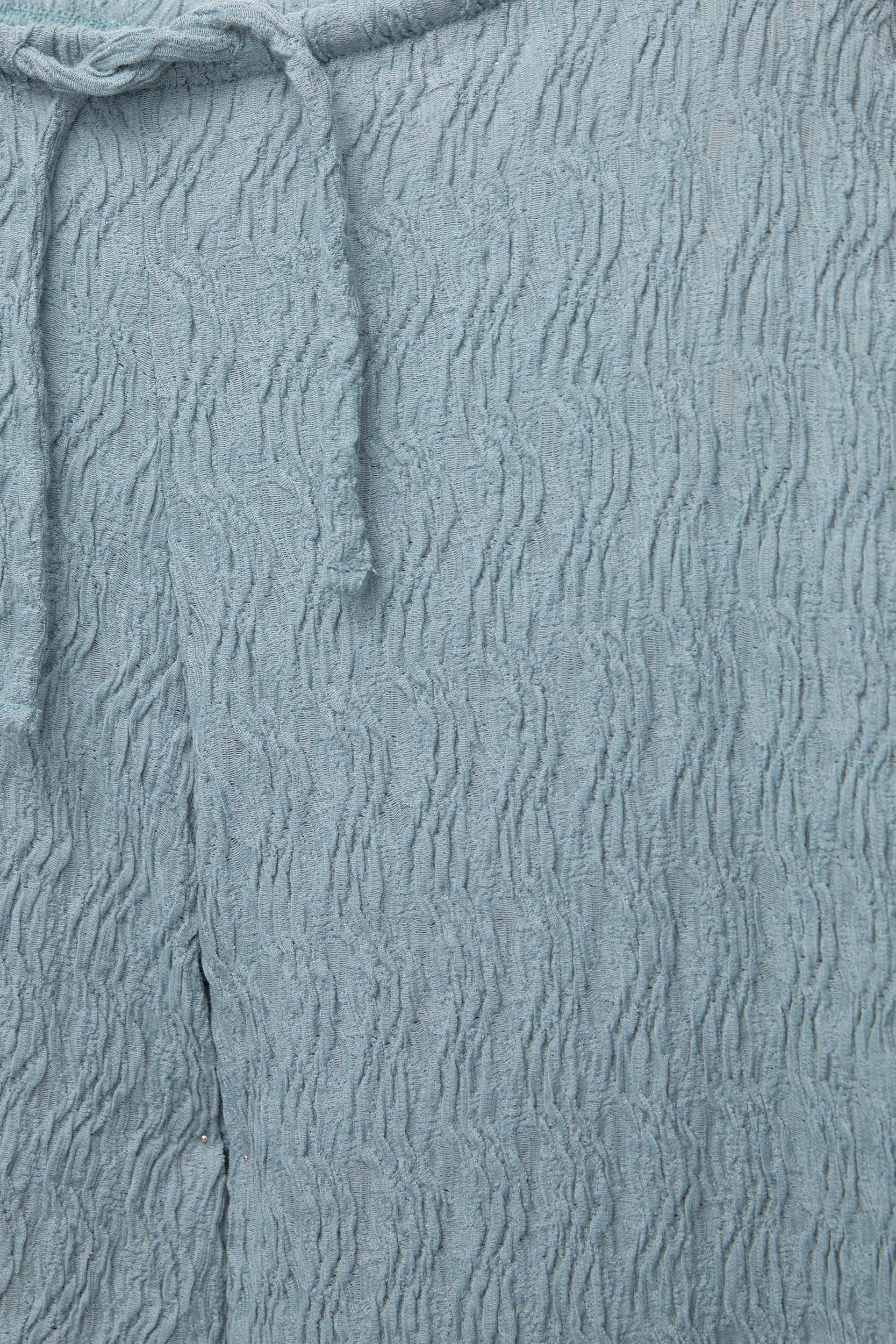 Textured loose-fitting pants Product Image