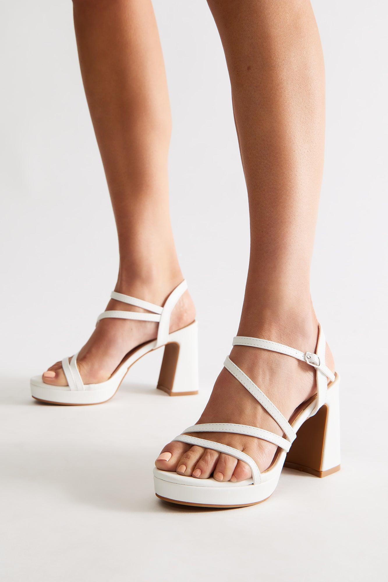 Adriel Faux Leather Ankle Strap Heels - White Product Image