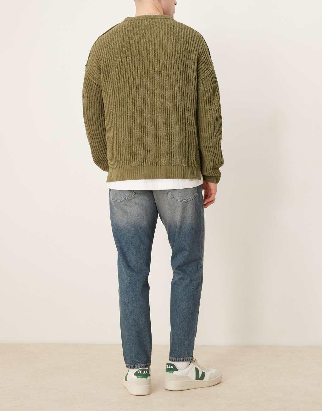 ASOS DESIGN tapered jeans in mid wash Product Image