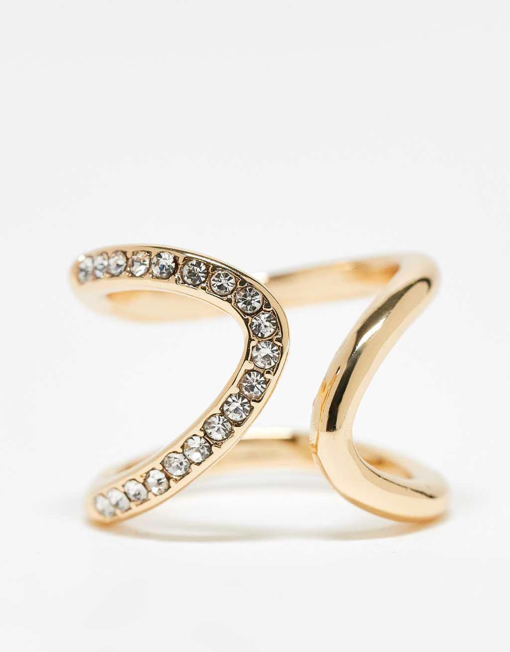 ASOS DESIGN Curve ring with wrap around crystal detail in gold tone Product Image