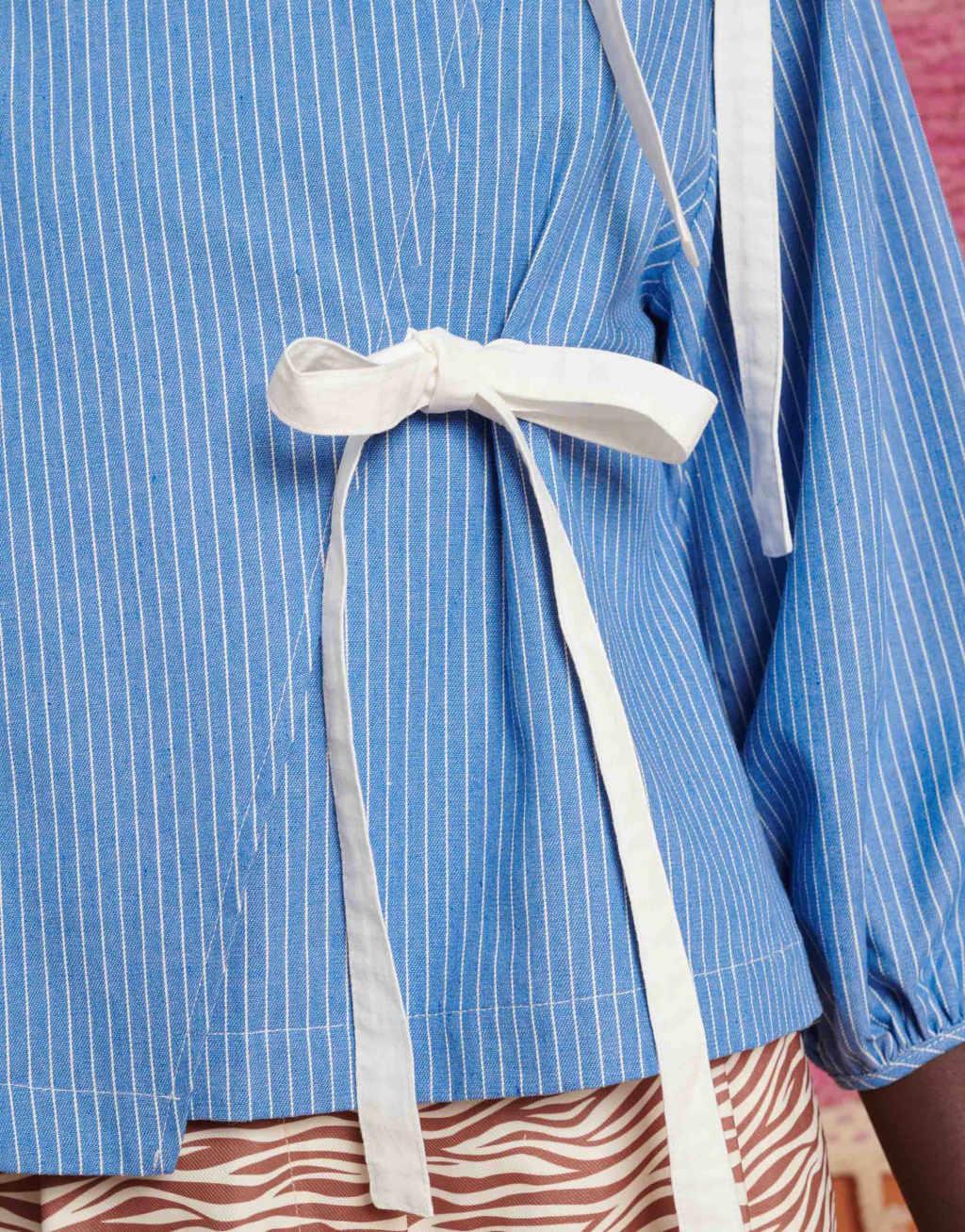 Ghospell bow detail top in blue stripe Product Image