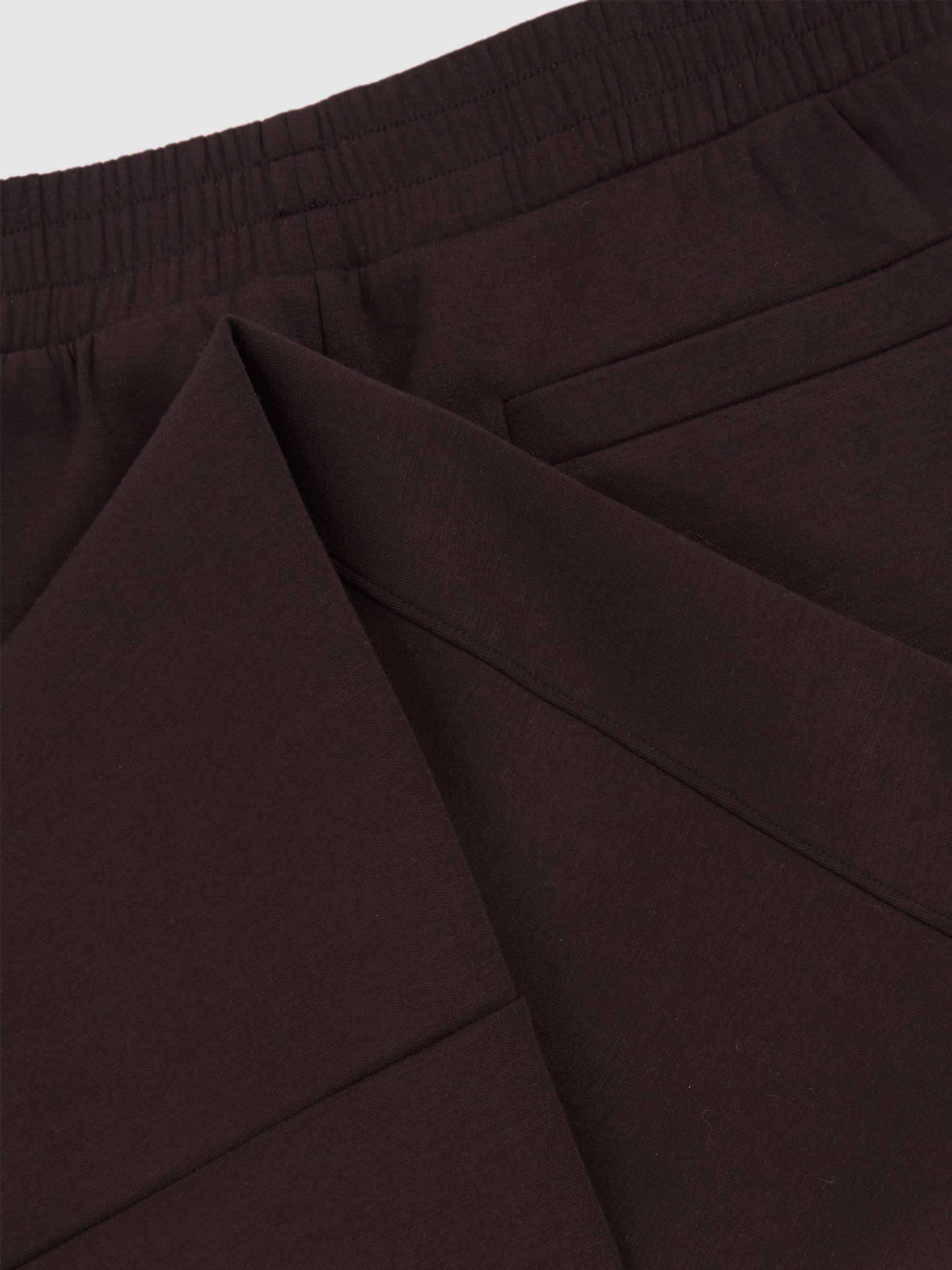Interlock Tapered Joggers in Plum Product Image