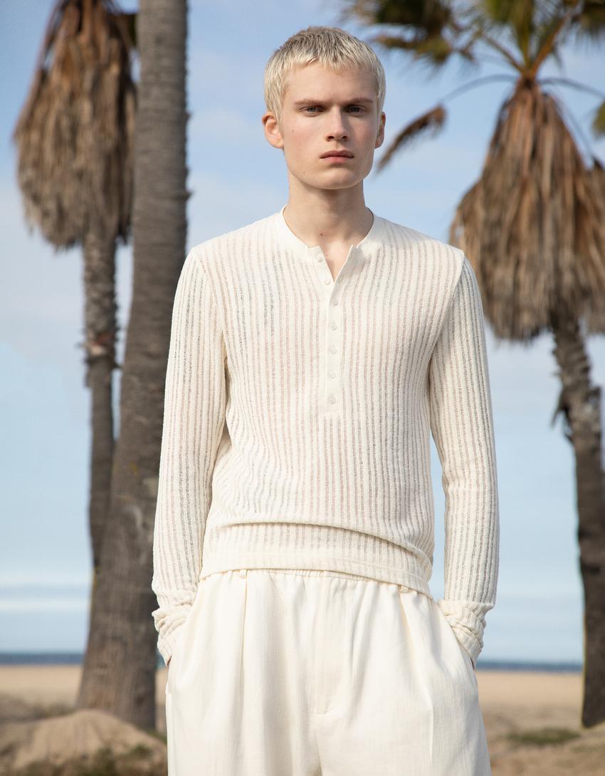 Open knit sweater with buttons Product Image