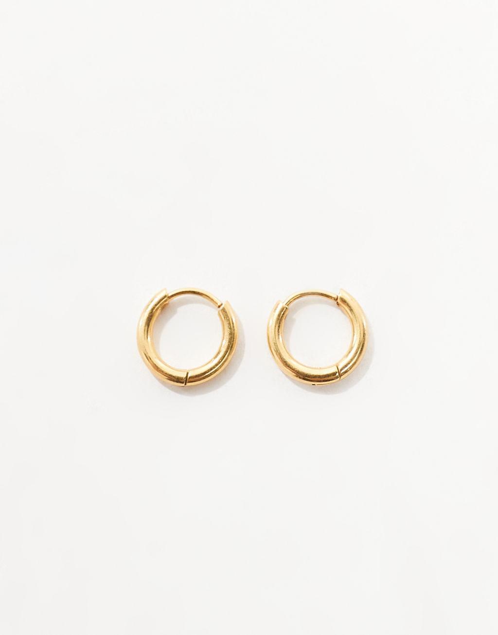 ASOS DESIGN waterproof stainless steel huggie hoop earrings in gold tone Product Image