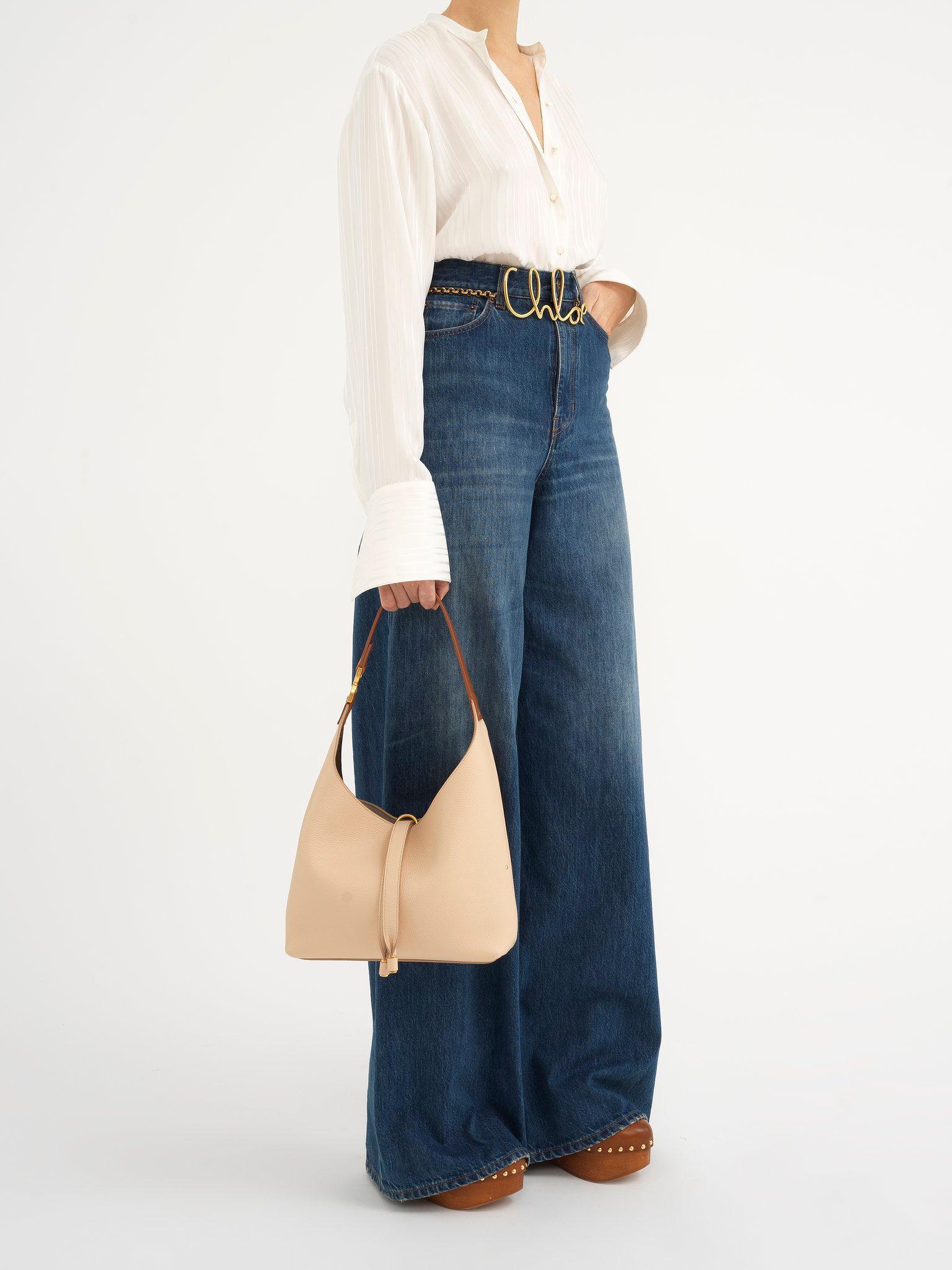 Small Marcie hobo bag in grained leather Product Image