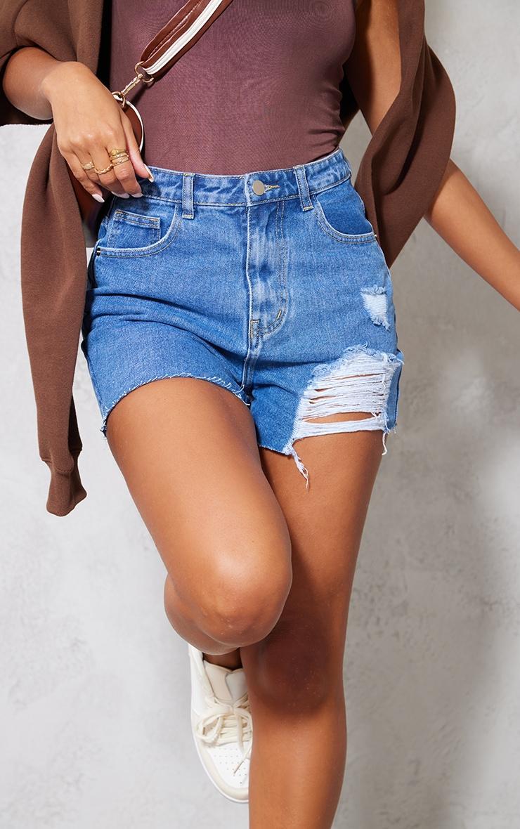 PRETTYLITTLETHING Mid Blue Wash Ripped Denim Mom Shorts Product Image