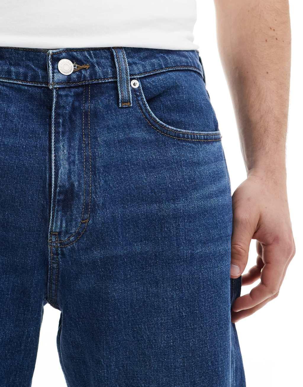 Tommy Jeans Isaac tapered jeans in dark wash Product Image