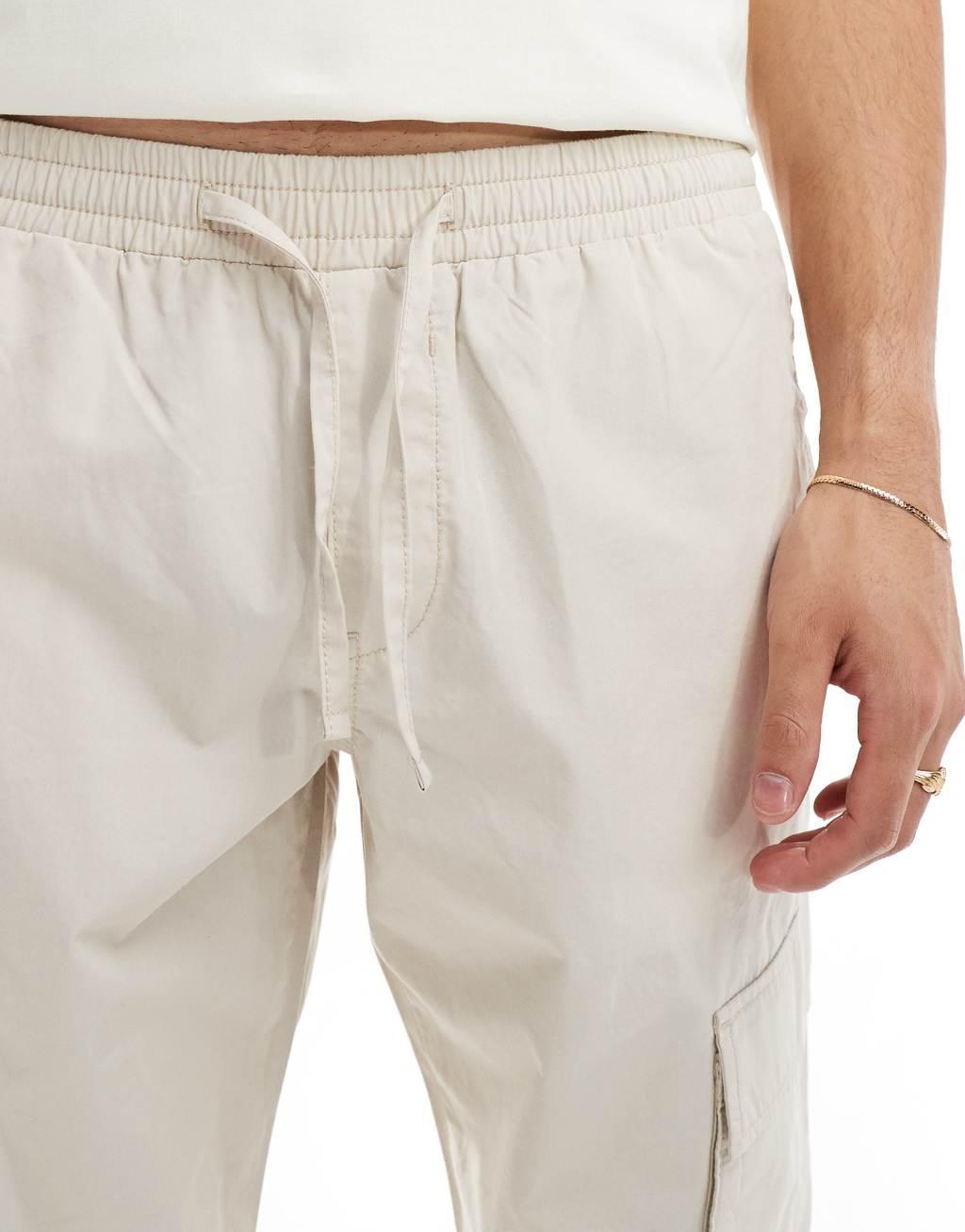 ASOS DESIGN tapered pull on pants in stone Product Image