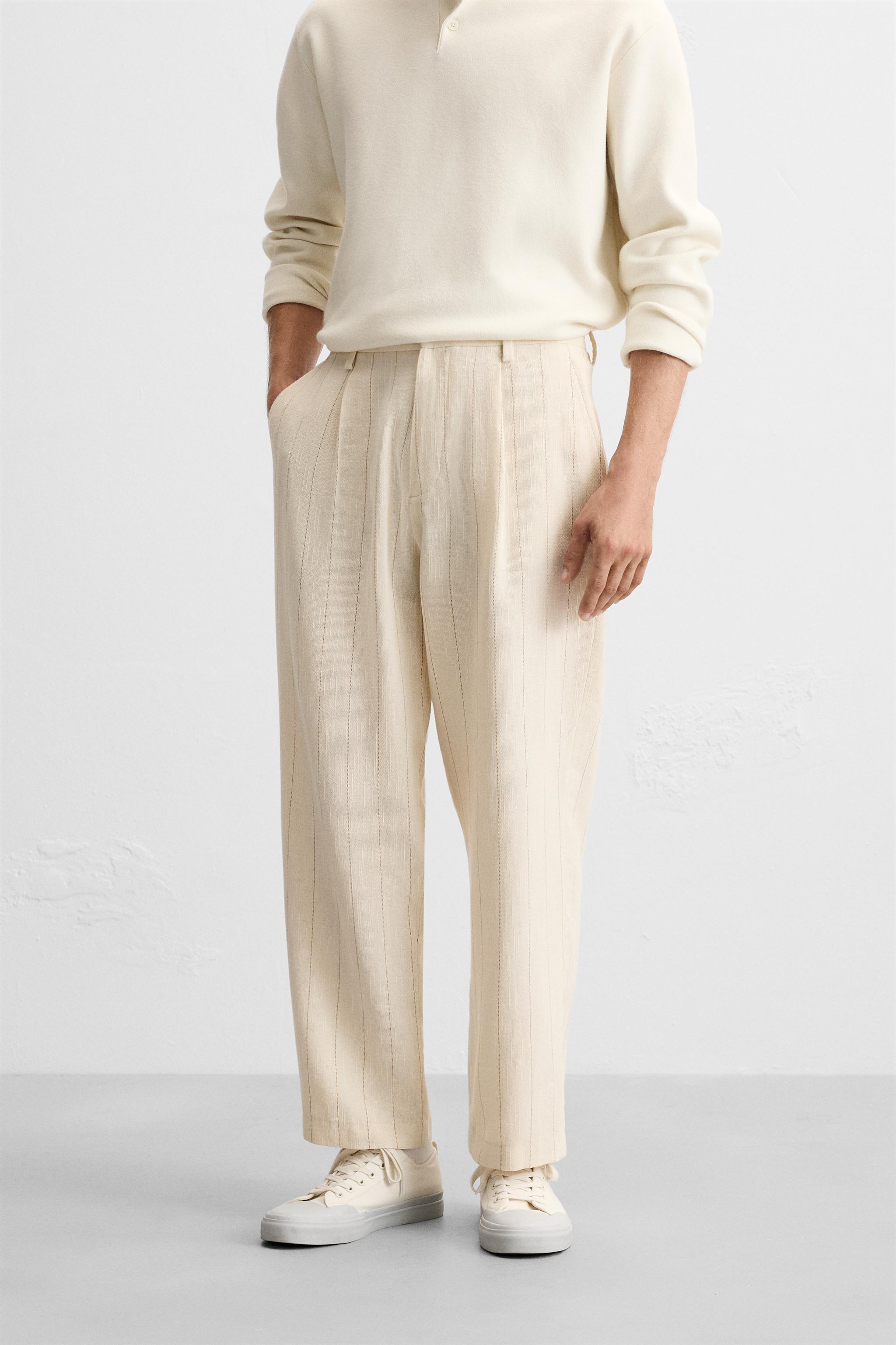 PLEATED STRIPED PANTS Product Image