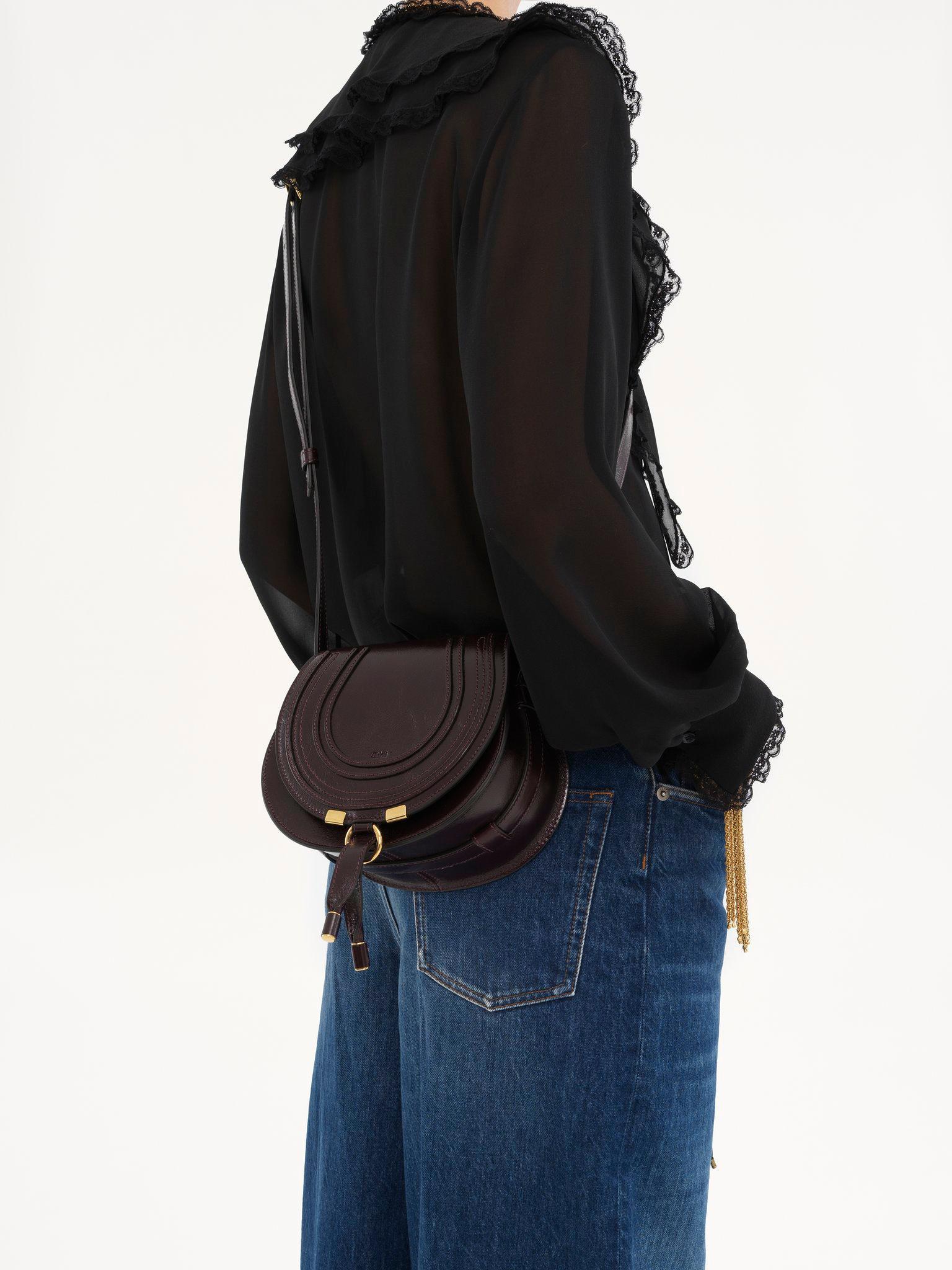 Small Marcie saddle bag in shiny leather Product Image