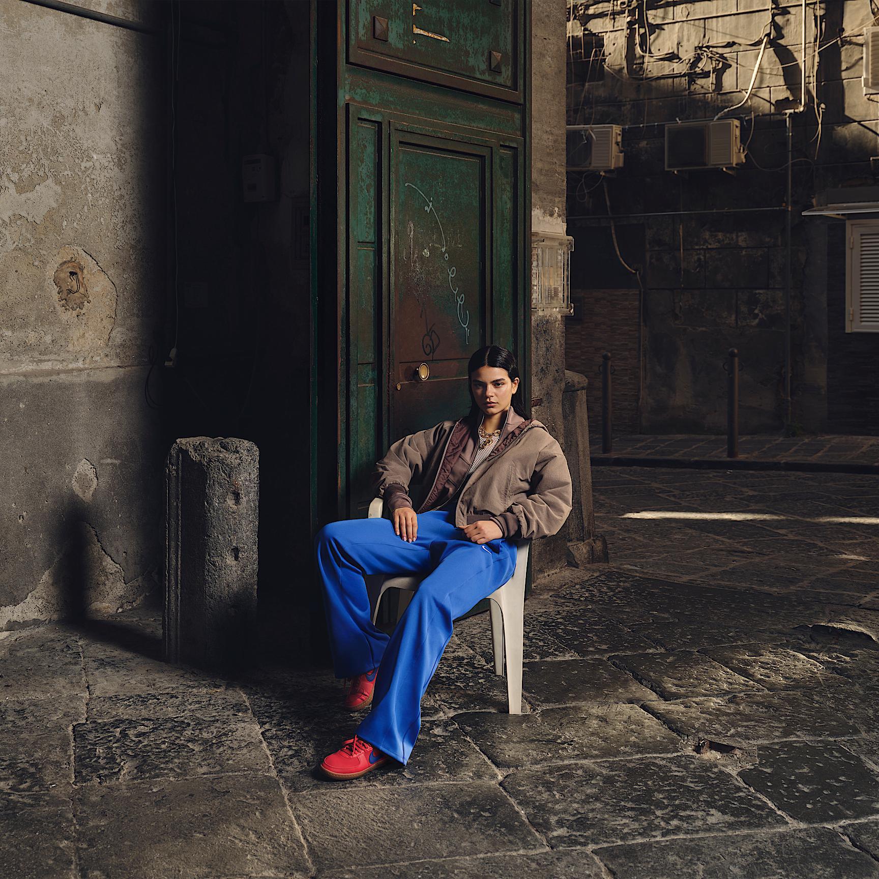 Womens Nike Sportswear Windrunner Mid-Rise Slim Knit Pants | HJ1016-010 Product Image