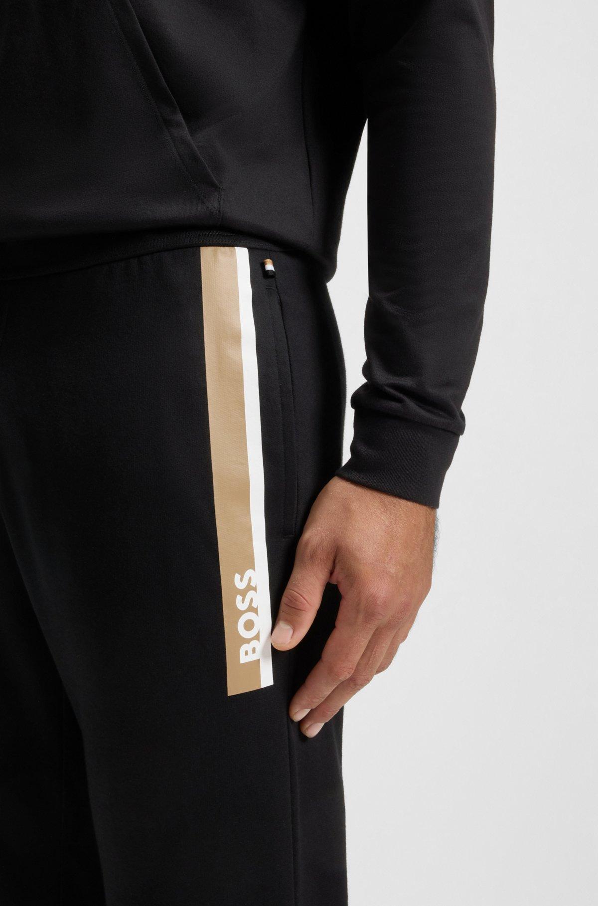 Cotton-terry tracksuit bottoms with stripe print Product Image