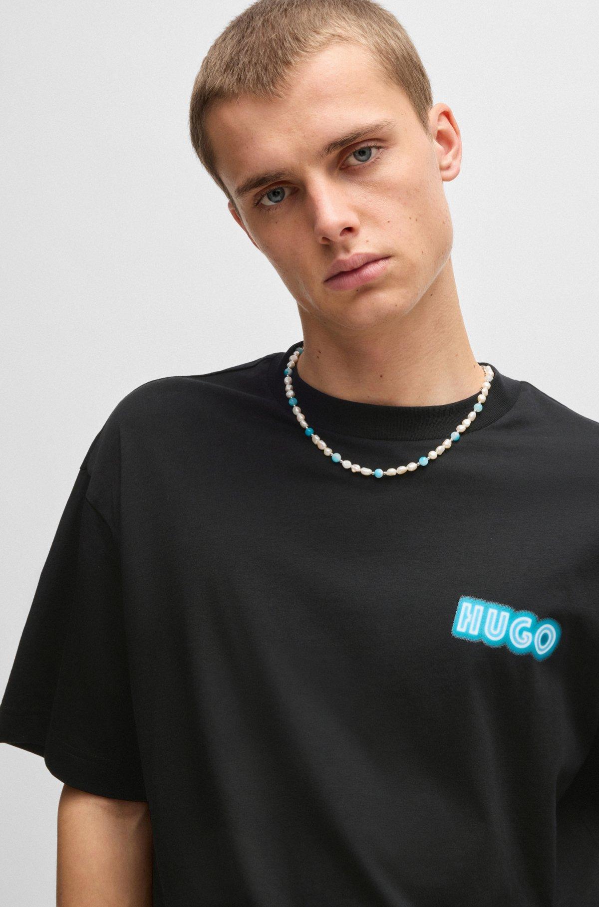 HUGO - Cotton-jersey T-shirt with logo artwork - Black Product Image