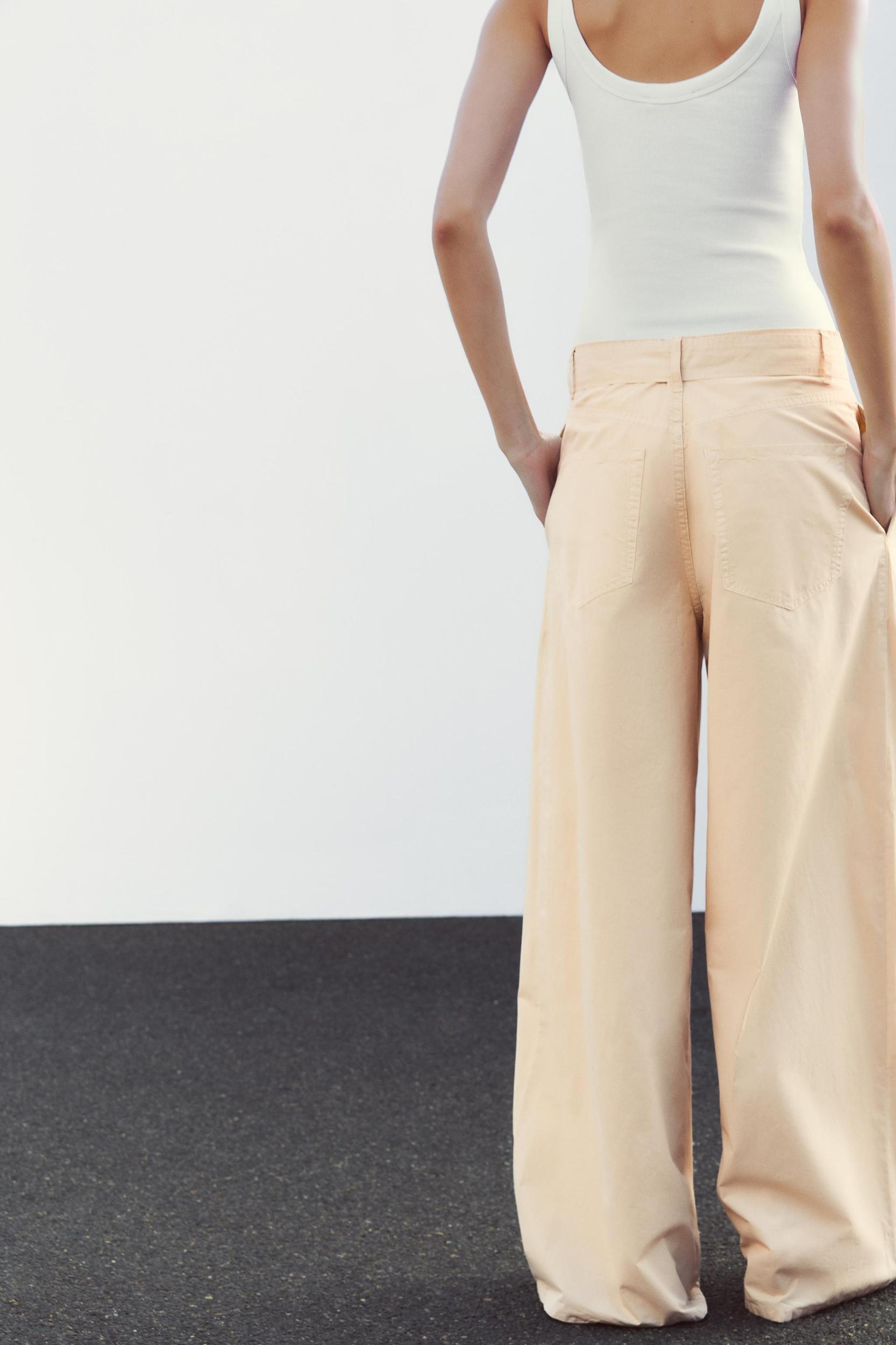 PLEATED BELTED PANTS Product Image