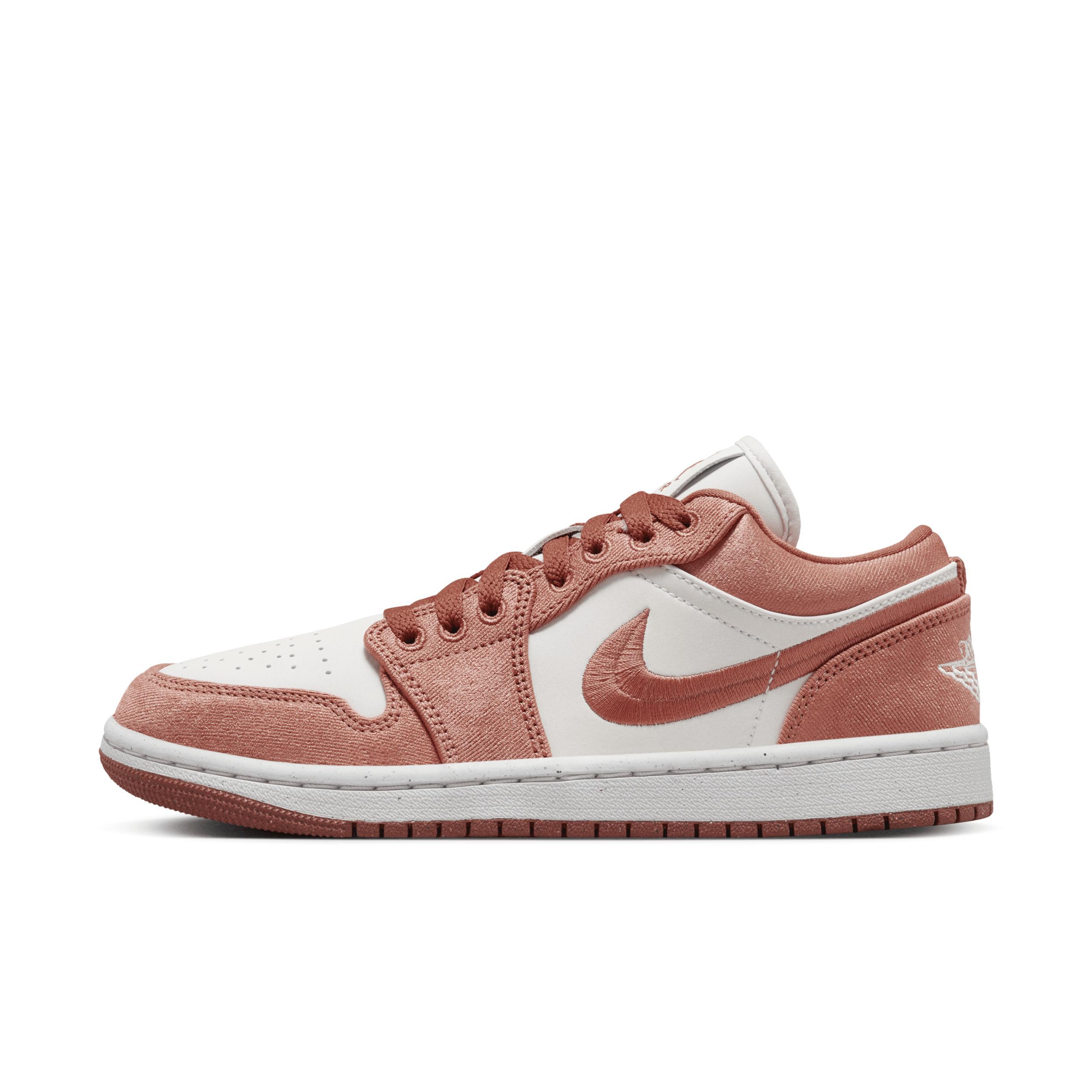 Nike Air Jordan 1 Low SE sneakers in orange & white Product Image