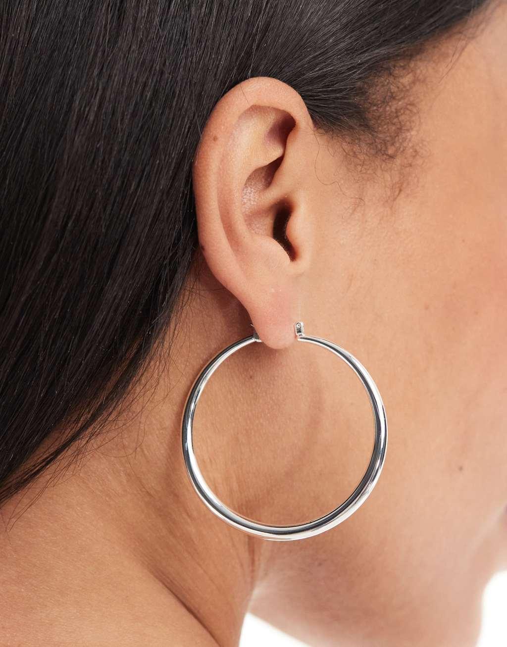 ASOS DESIGN silver plated earrings with graduated skinny hoop detail Product Image