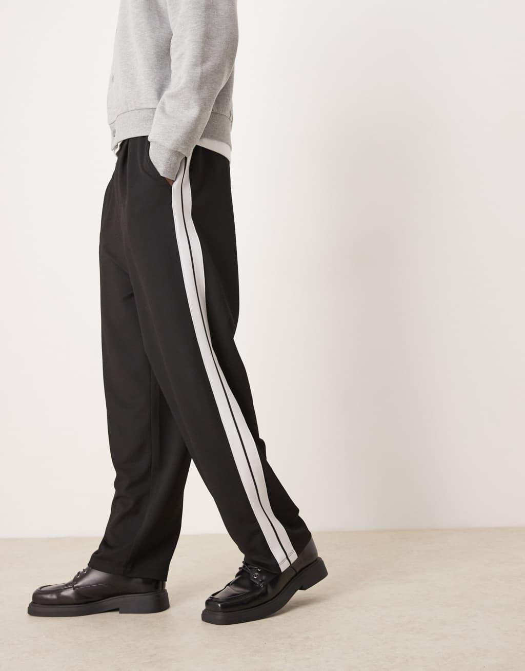 ASOS DESIGN super baggy smart sweatpants with taping in black Product Image