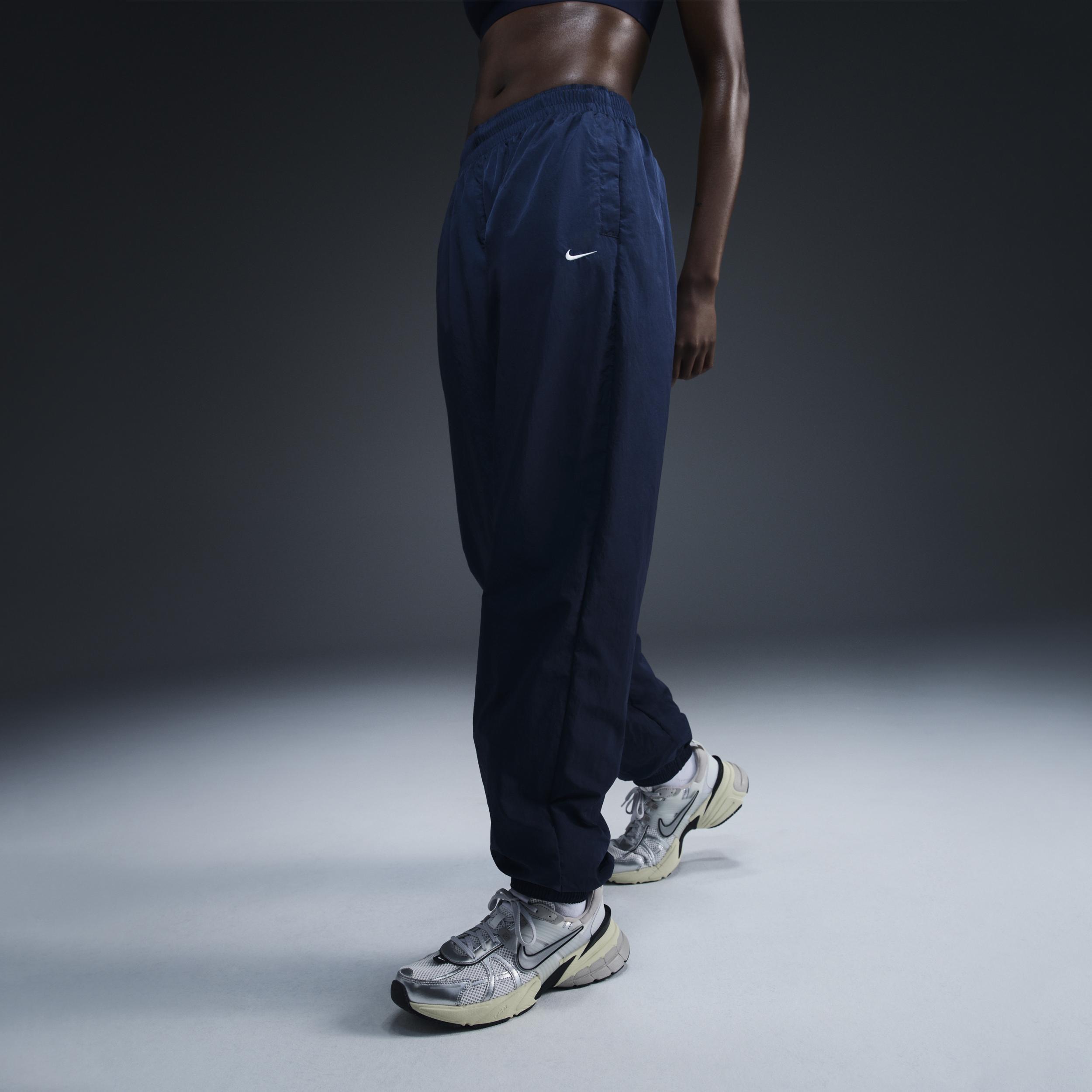 Women's Nike Sportswear Essential Mid-Rise Oversized Woven Jogger Pants Product Image