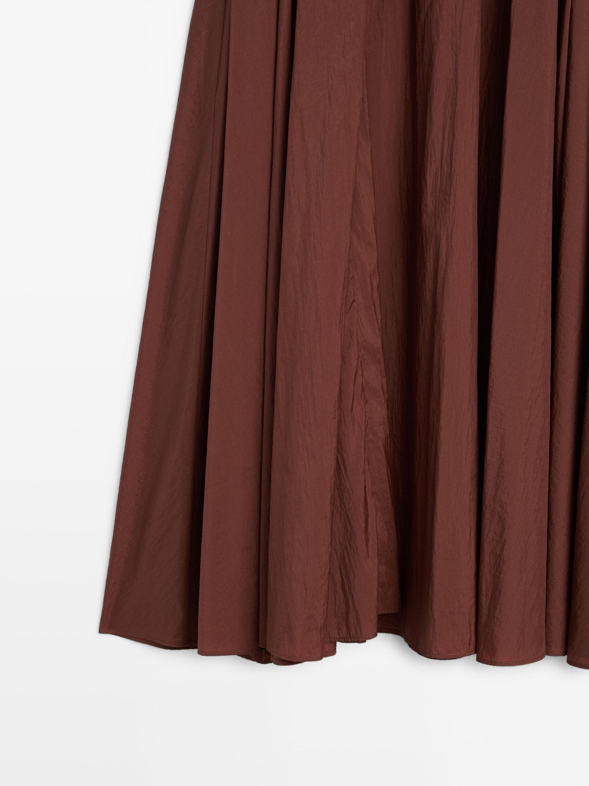 Pleated technical midi skirt Product Image