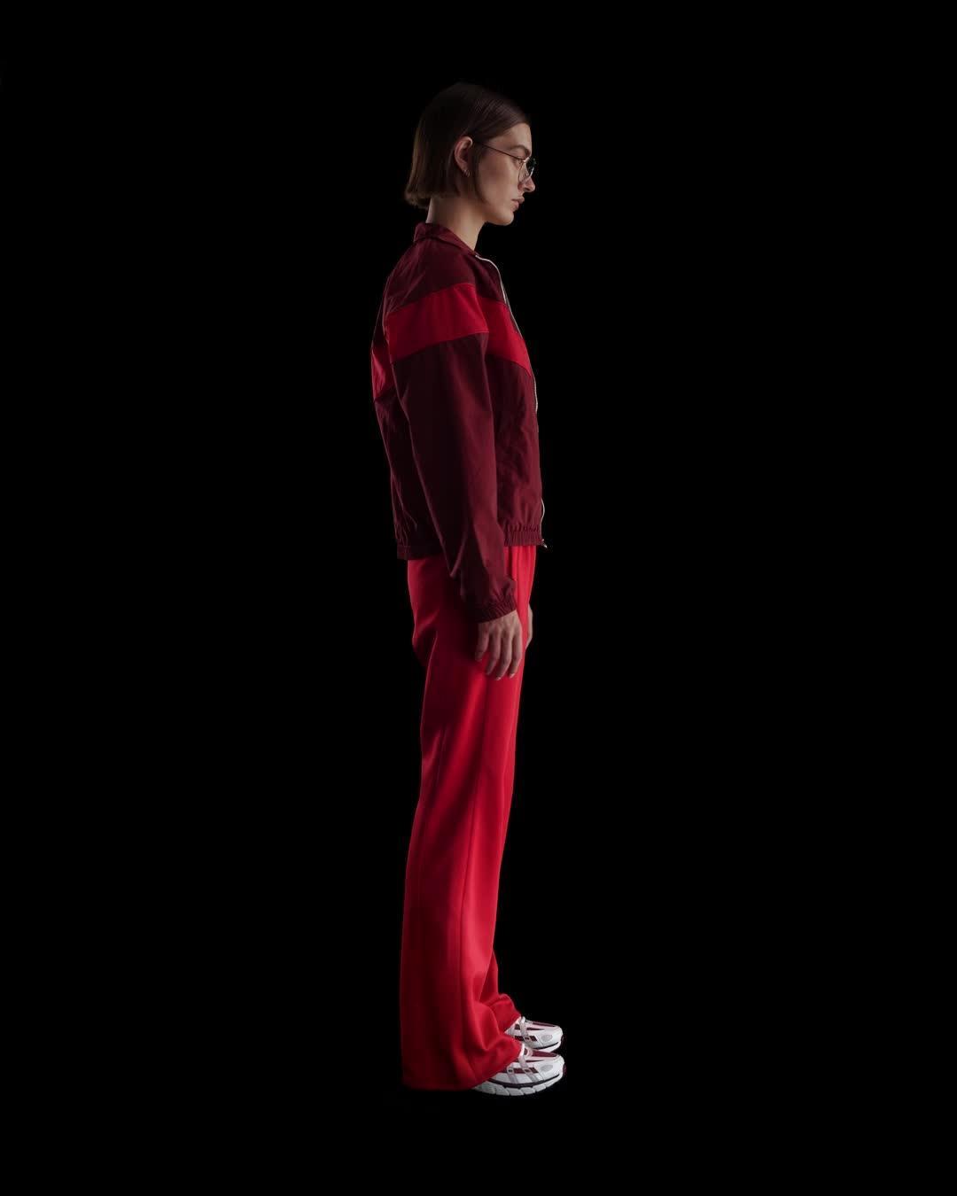 Nike Sportswear Windrunner Women's Mid-Rise Slim Knit Pants Product Image