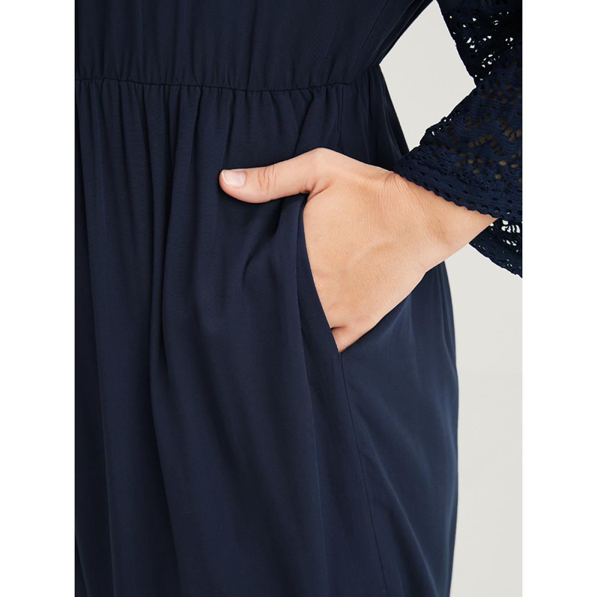 Plus Size Navy Solid Bell Sleeve Pocket Tie Contrast Lace Wrap Jumpsuit Women Elegant Elbow-length sleeve V-neck Dailywear Loose Jumpsuits BloomChic 10/M Product Image