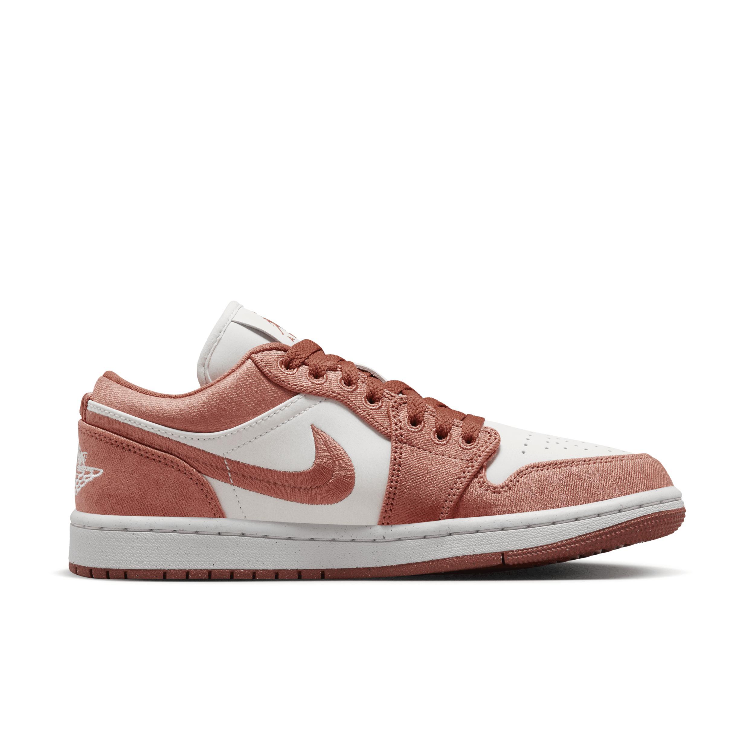 Nike Air Jordan 1 Low SE sneakers in orange & white Product Image