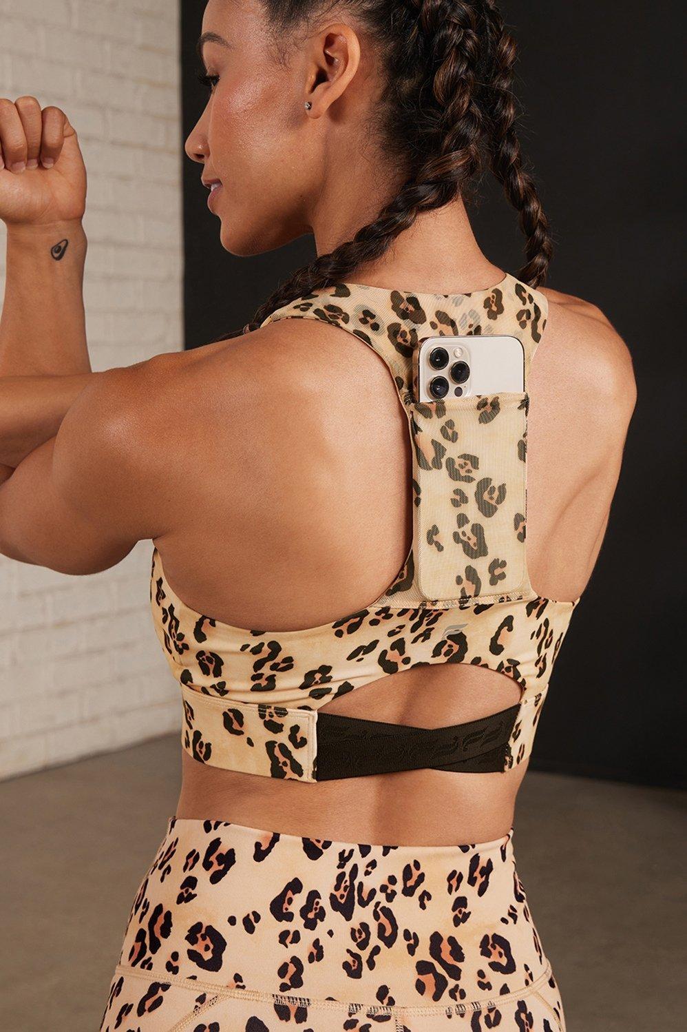 Fabletics On-The-Go Midi Medium Impact Sports Bra Womens Desert Leopard plus Size 4X Product Image