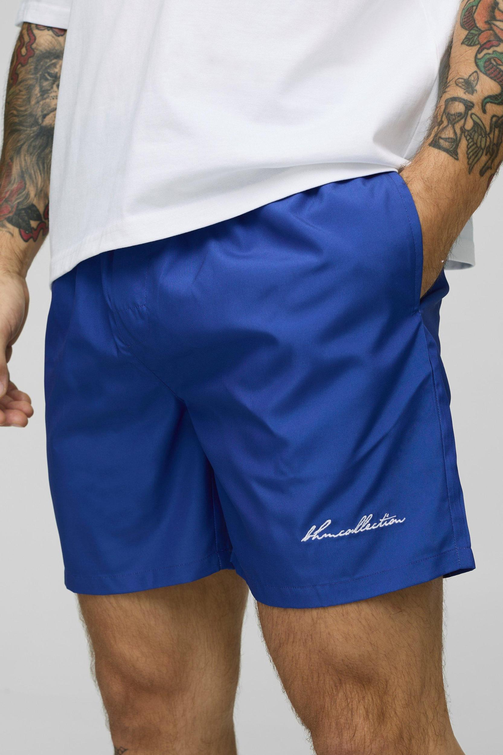 Mid Length Worldwide Swim Trunks | boohooMAN USA Product Image