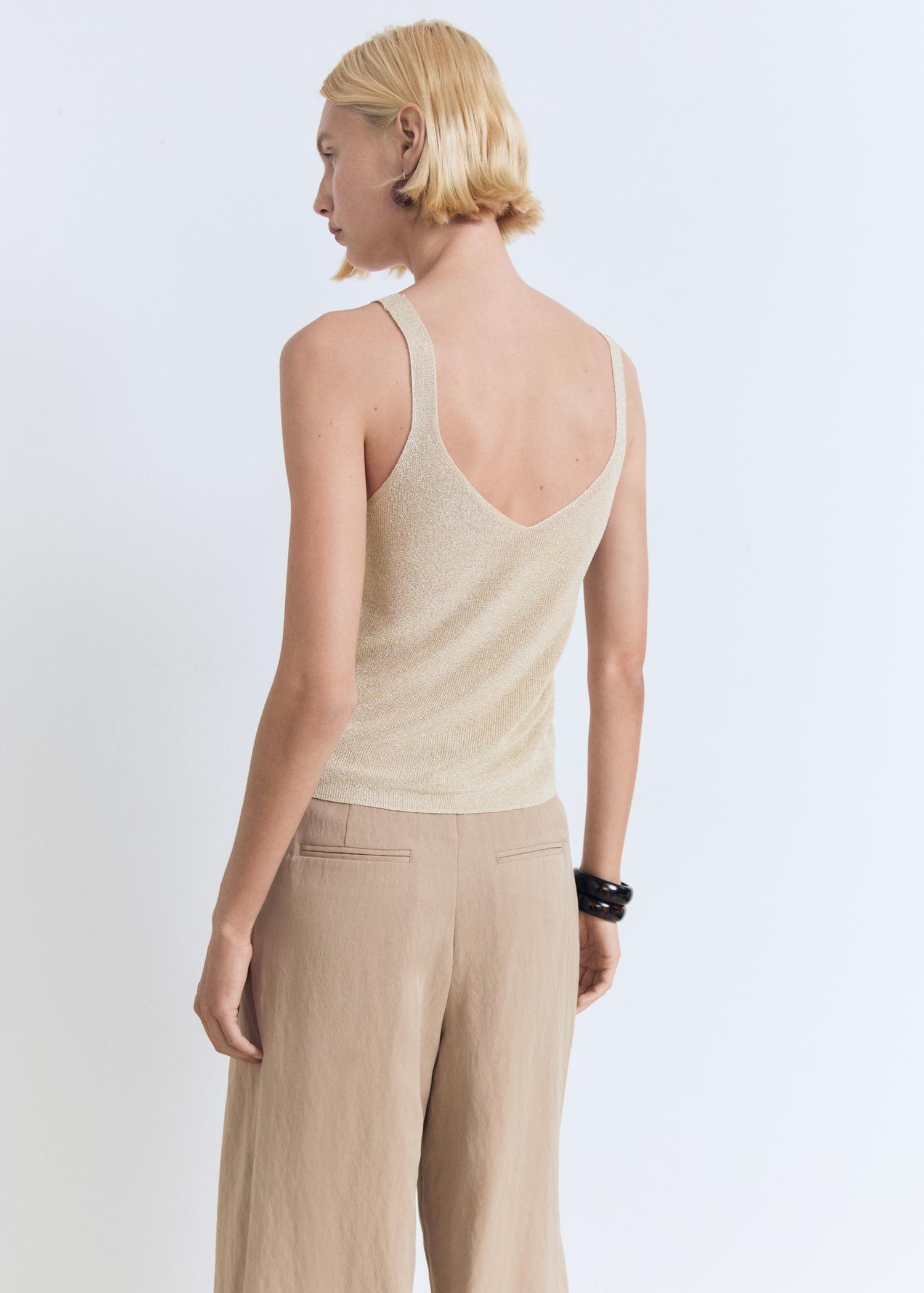 Lurex knitted V-neck top - Women | MANGO USA Product Image