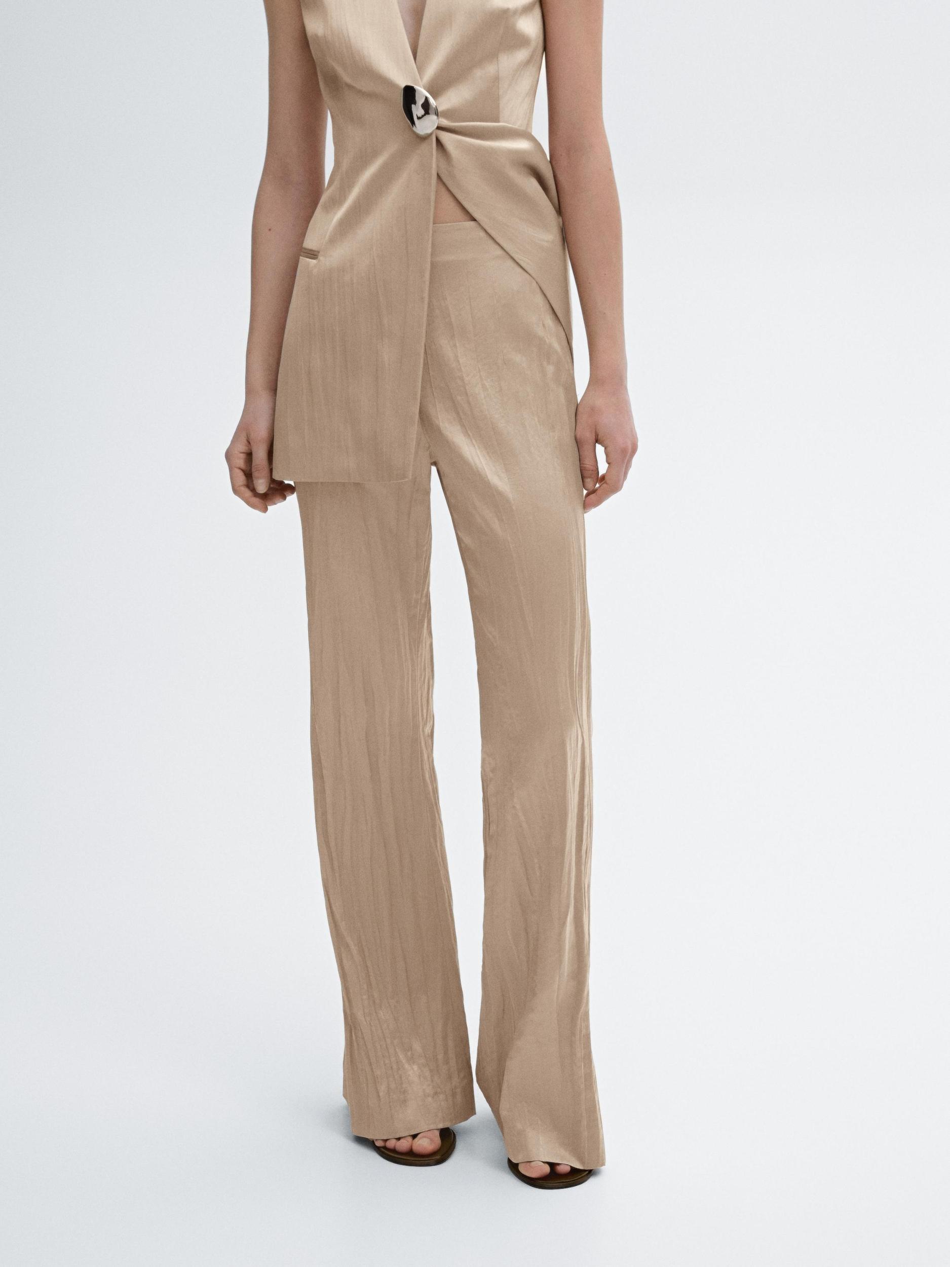 Flowing flared trousers Product Image
