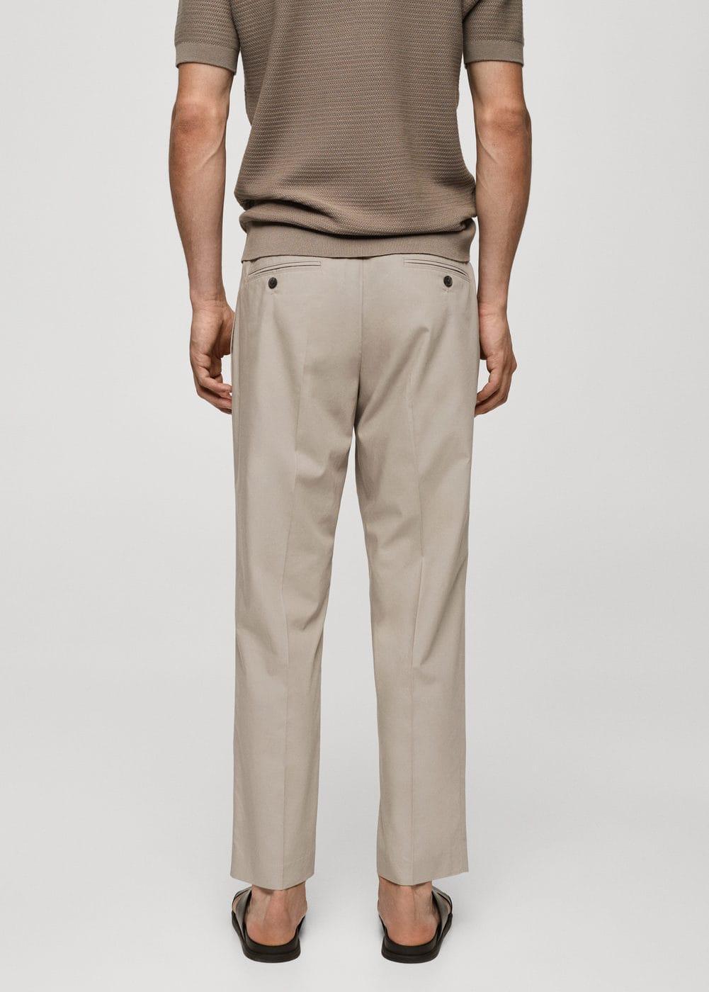 Slim-fit lyocell pleated trousers - Men | MANGO USA Product Image