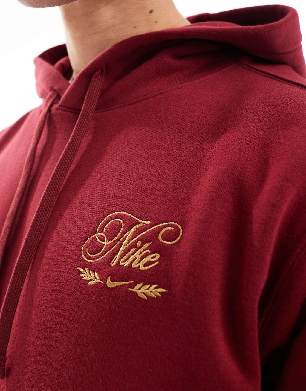 Nike 'Tis The Season logo hoodie in red Product Image