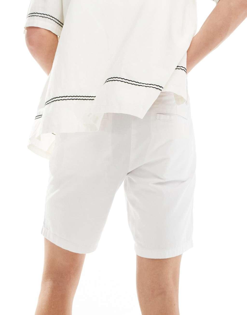 ASOS DESIGN slim stretch chino shorts in white Product Image