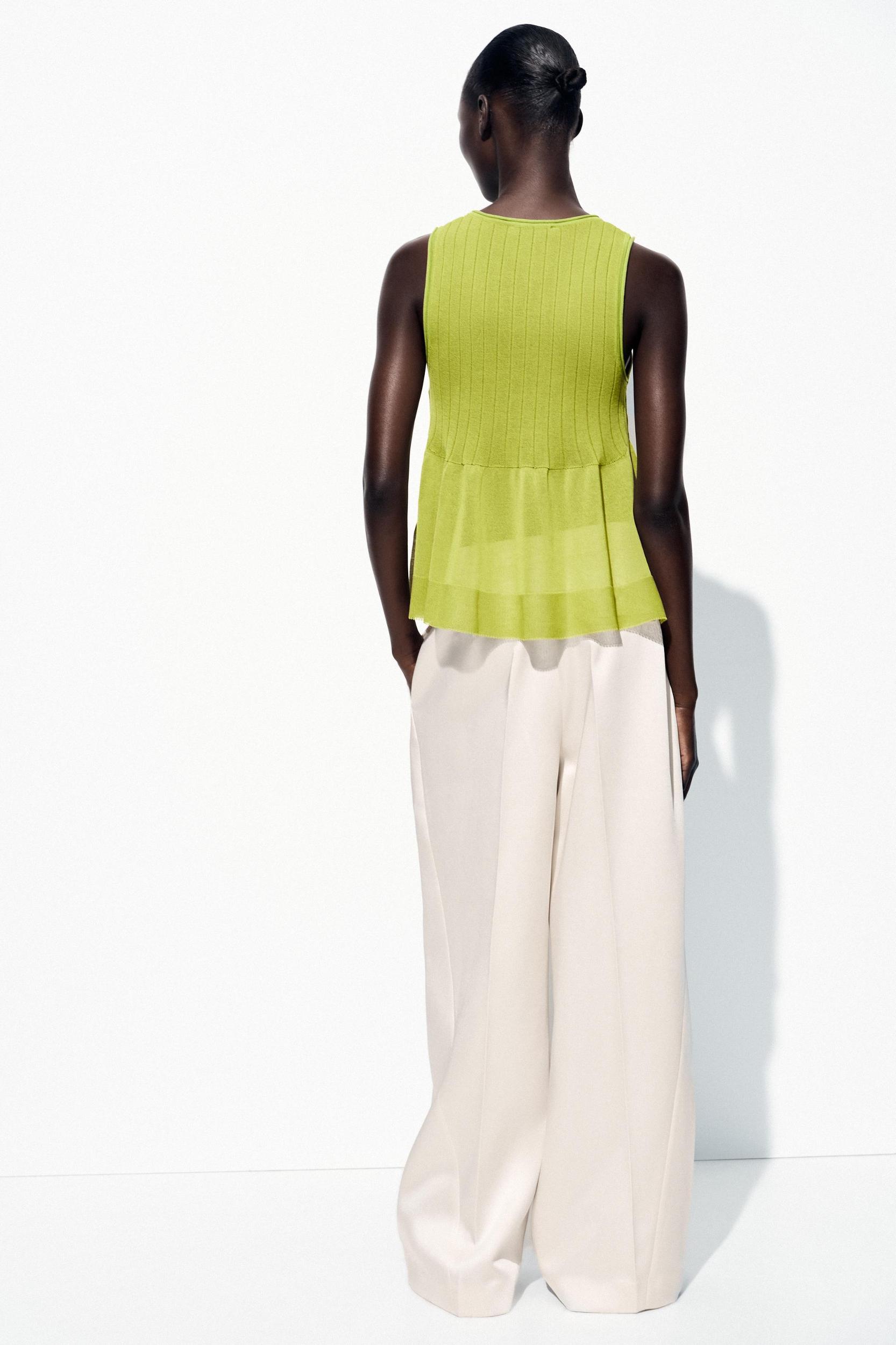 RUFFLED HEM KNIT TOP Product Image