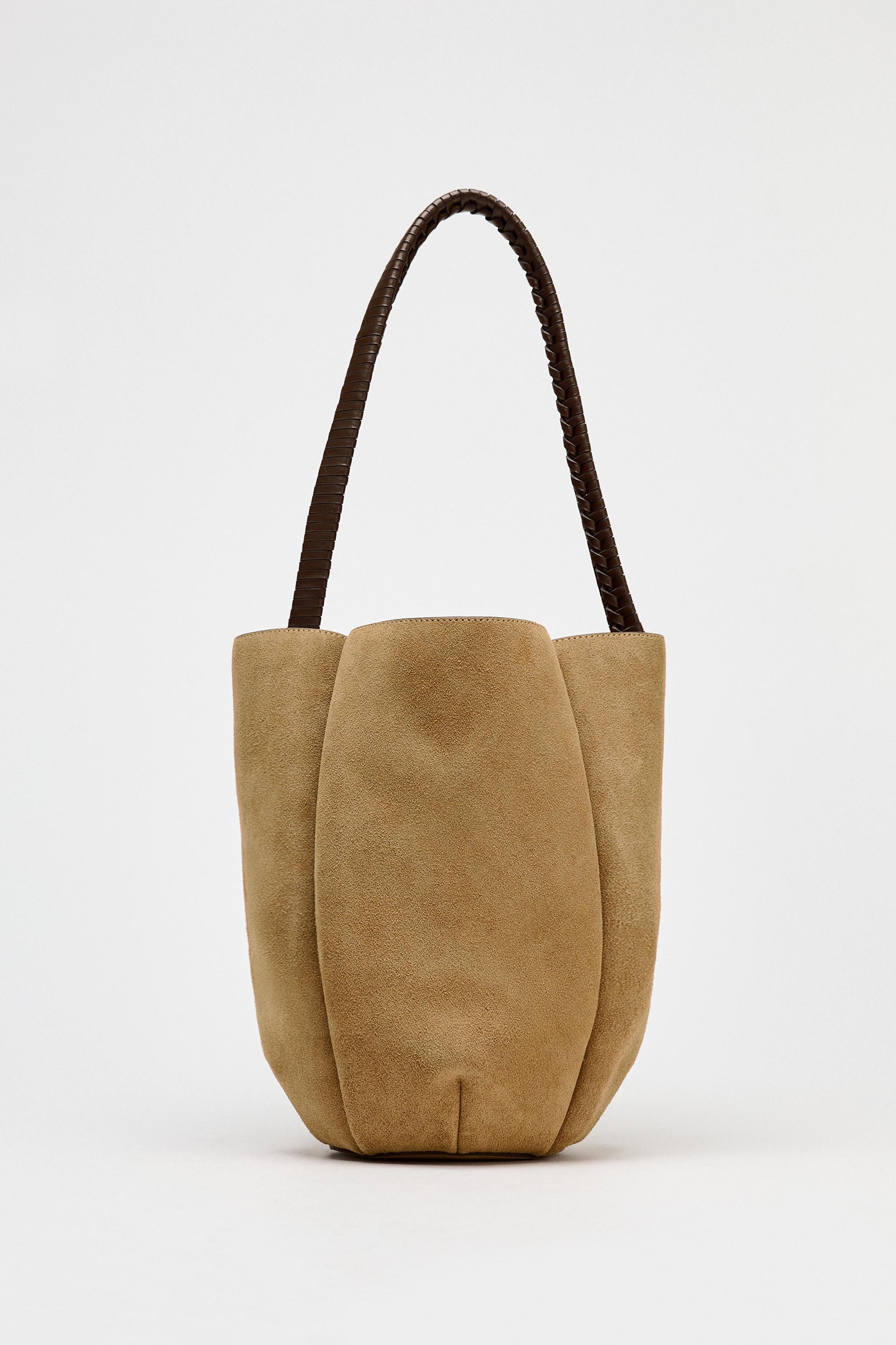 WOVEN SPLIT LEATHER FLOWER BUCKET BAG Product Image