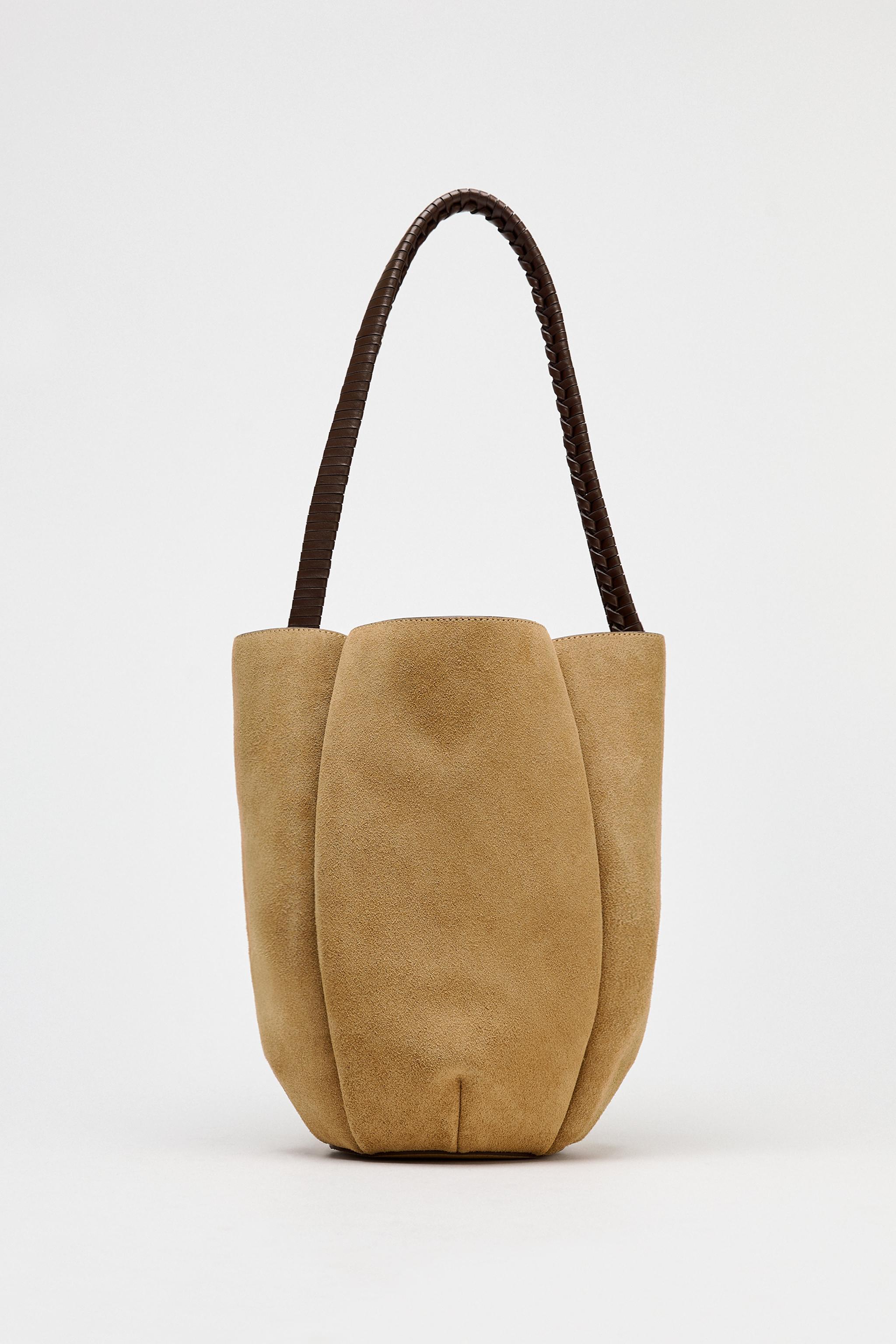 WOVEN SPLIT LEATHER FLOWER BUCKET BAG Product Image